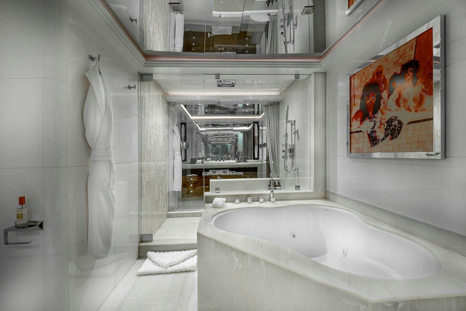 a bathroom with a bathtub and a shower aboard KING BABY Yacht for Charter