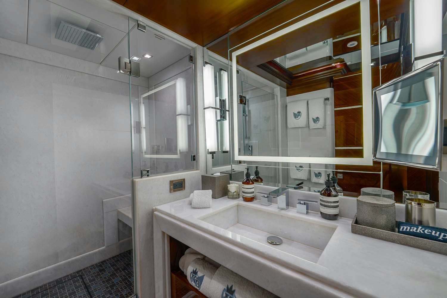 a bathroom with a large mirror aboard KING BABY Yacht for Charter