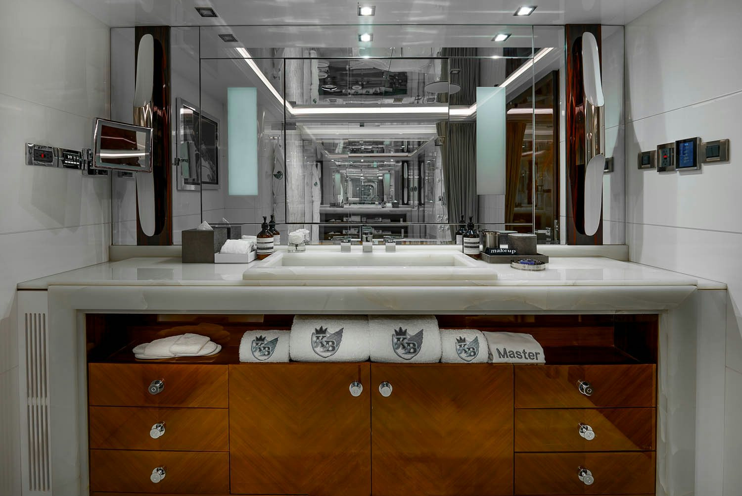 a bathroom with a large mirror aboard KING BABY Yacht for Charter