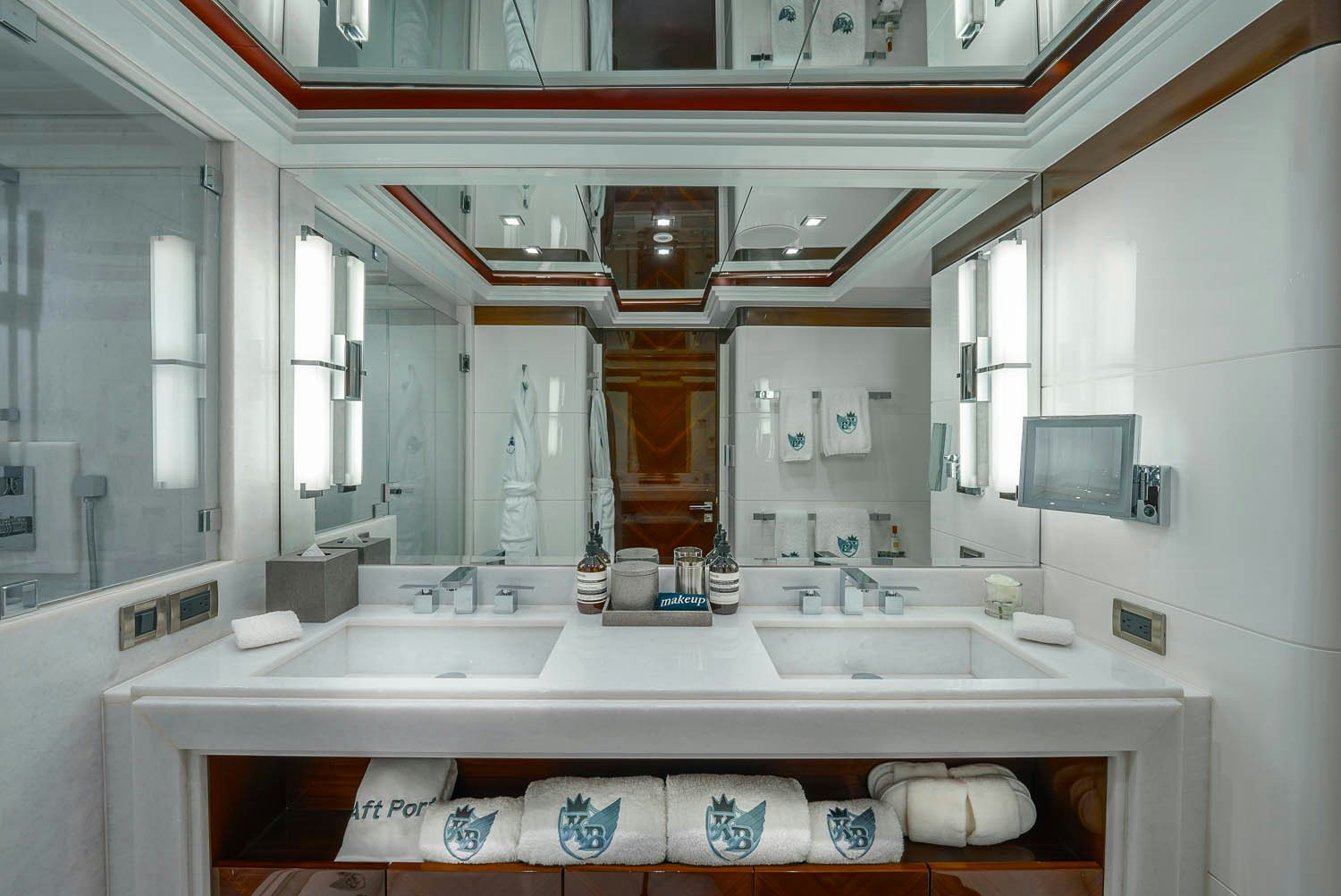 a bathroom with a large mirror aboard KING BABY Yacht for Charter