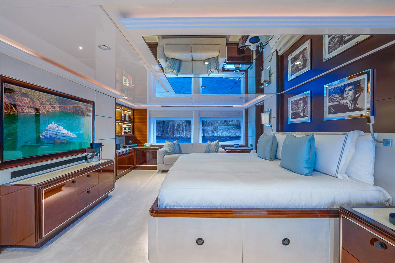a room with a bed and a tv aboard KING BABY Yacht for Charter