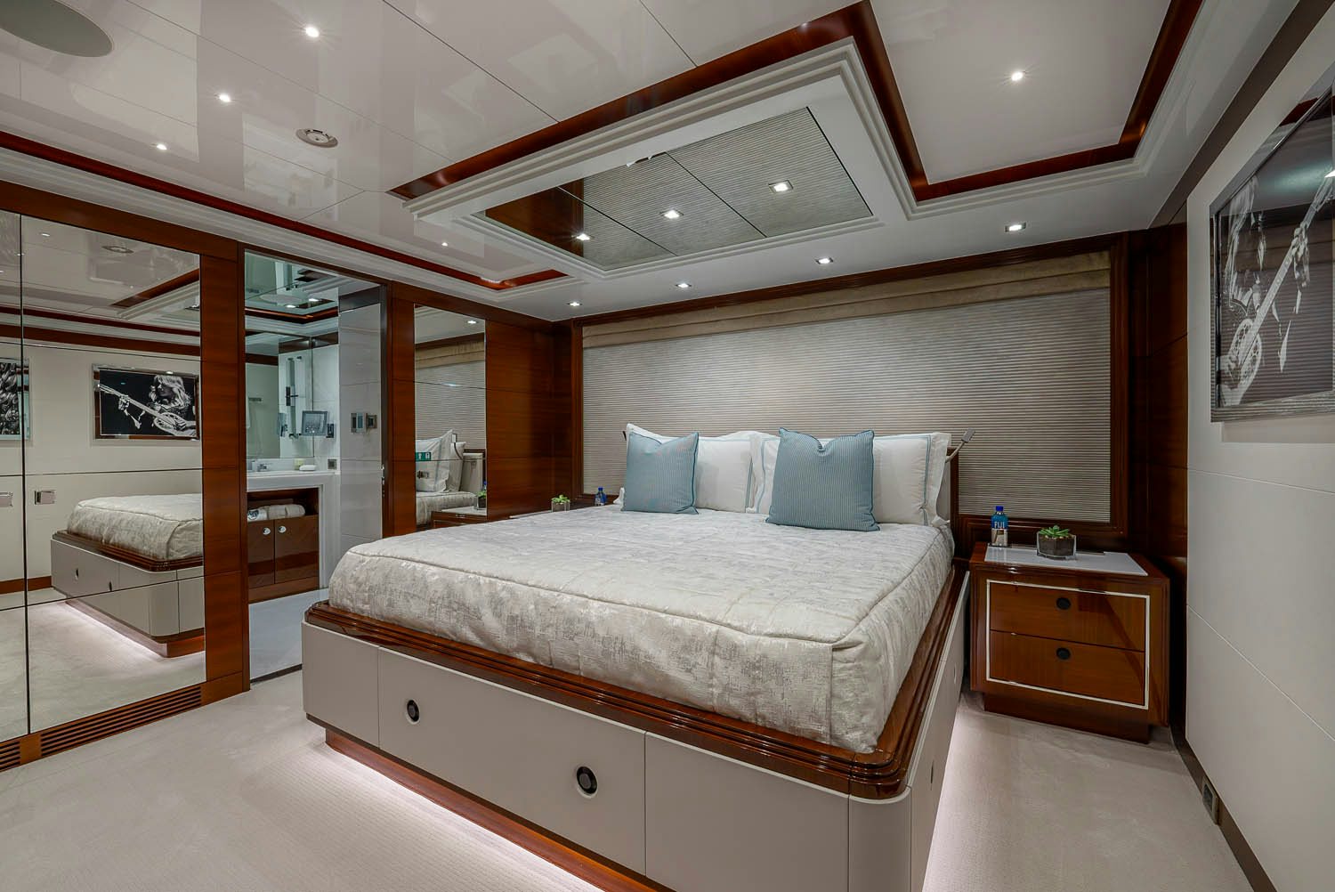 a large bed in a room aboard KING BABY Yacht for Charter