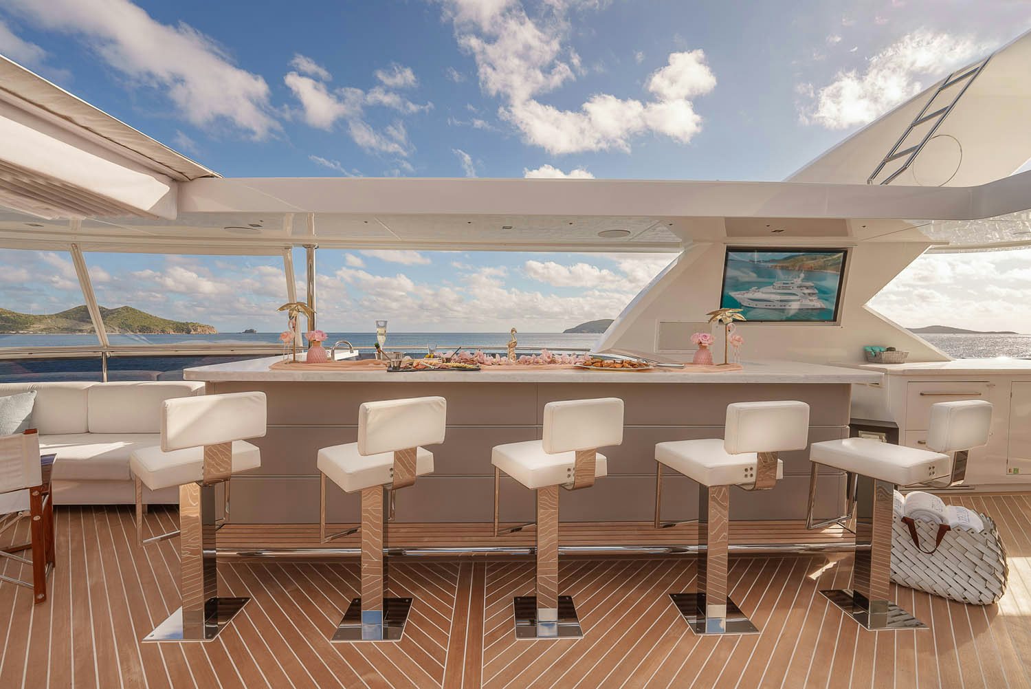 a room with chairs and a table aboard KING BABY Yacht for Charter