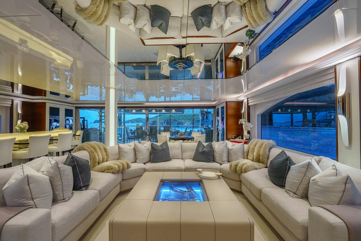 a living room with a large window aboard KING BABY Yacht for Charter