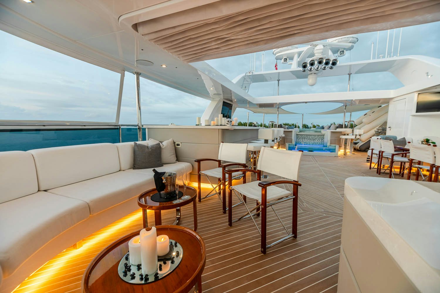 a room with a couch and a table and chairs aboard KING BABY Yacht for Charter