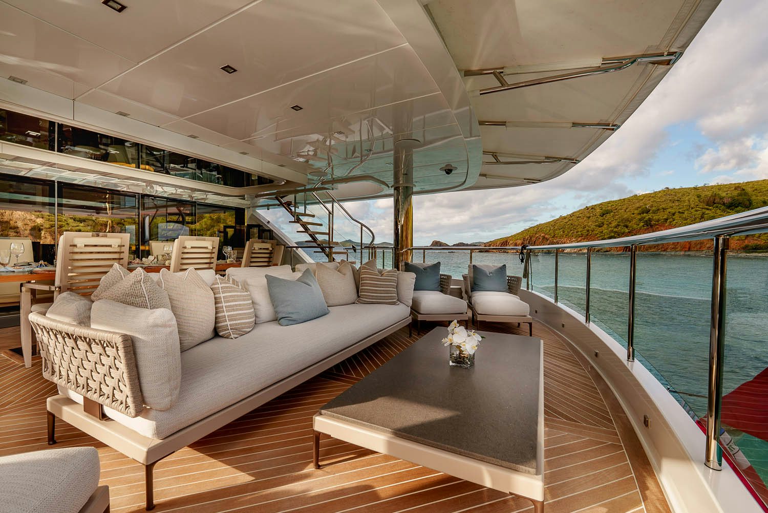 a large living room with a large balcony aboard KING BABY Yacht for Charter