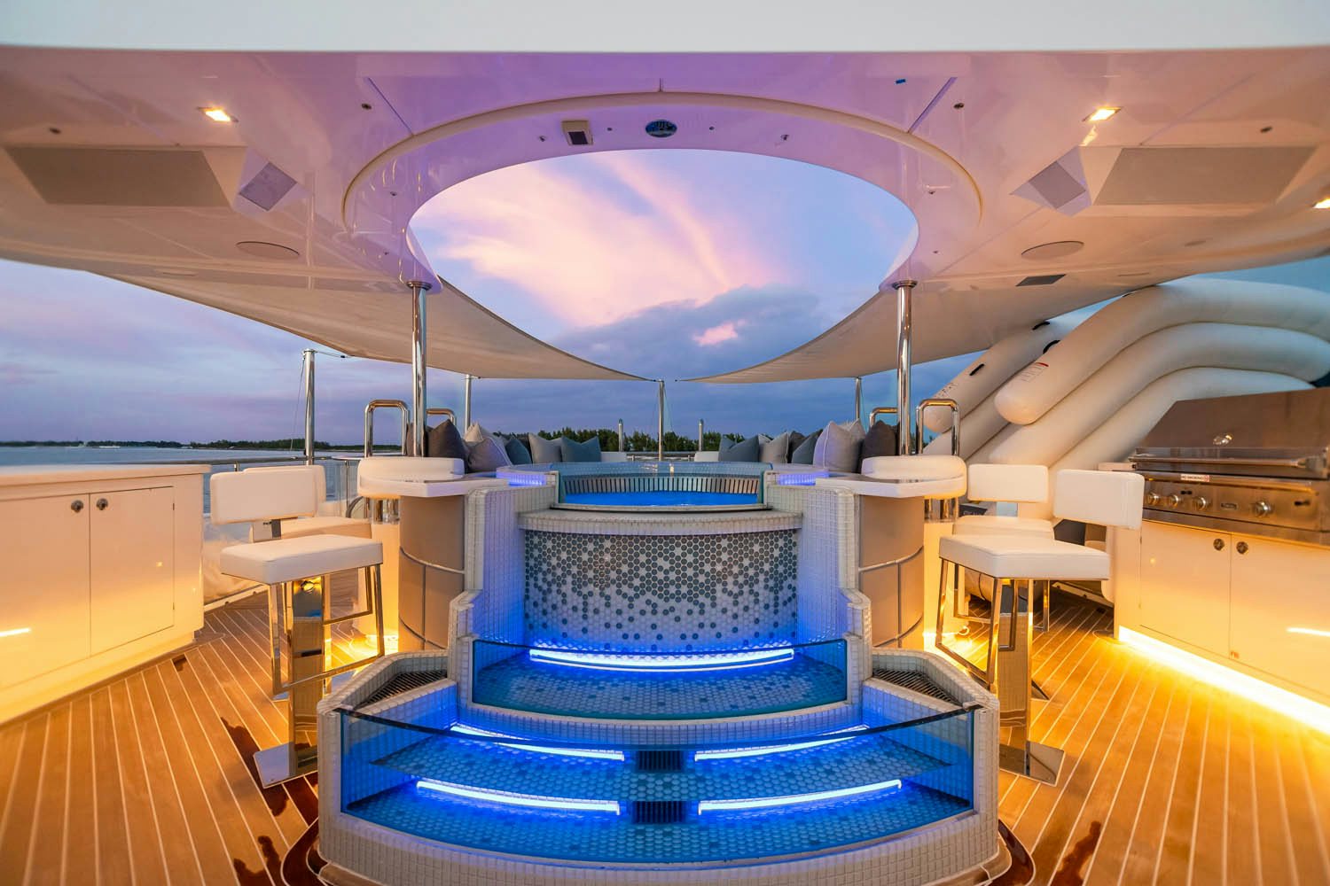 a room with a large blue and pink circular object aboard KING BABY Yacht for Charter