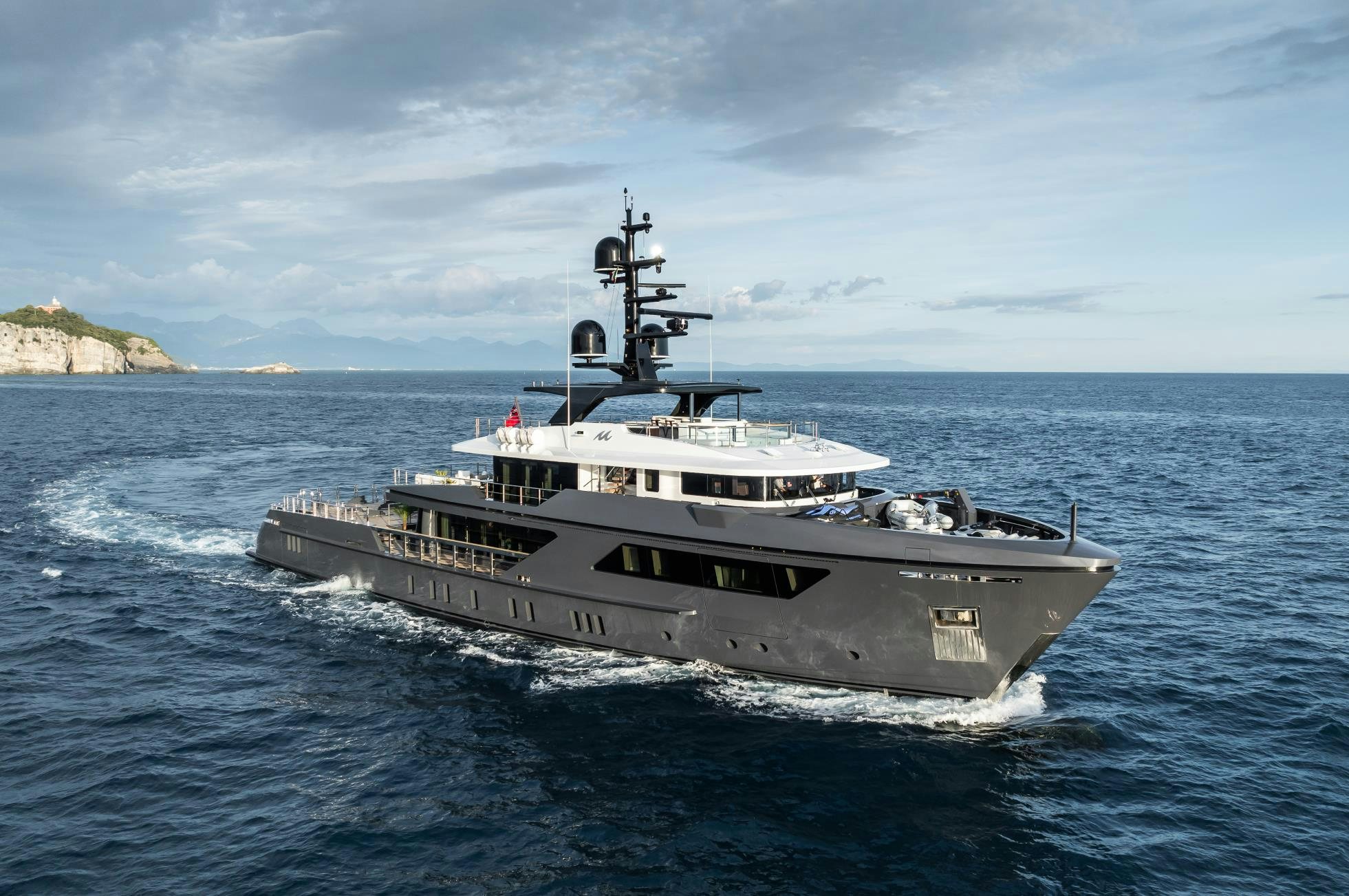 a large white boat in the water aboard M Yacht for Sale