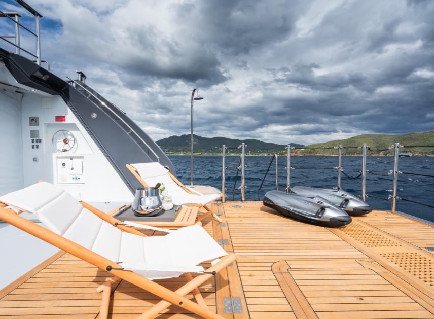 a boat on a deck aboard M Yacht for Sale