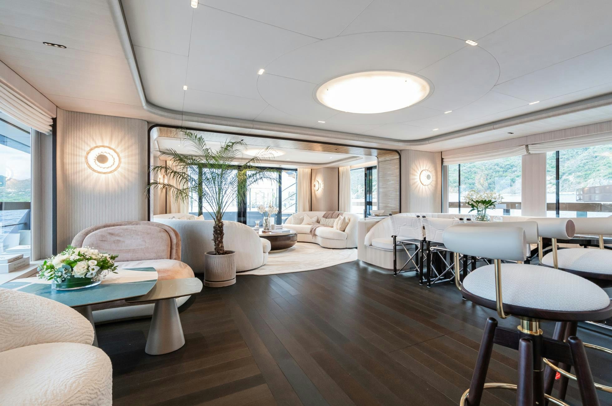 a living room with a wood floor aboard M Yacht for Sale