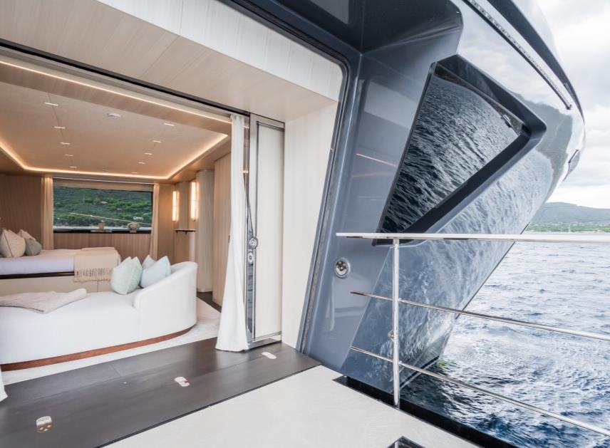 a room with a couch and a bed aboard M Yacht for Sale