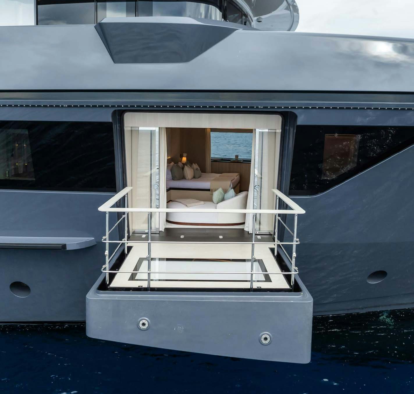 a boat with a couple of people in it aboard M Yacht for Sale