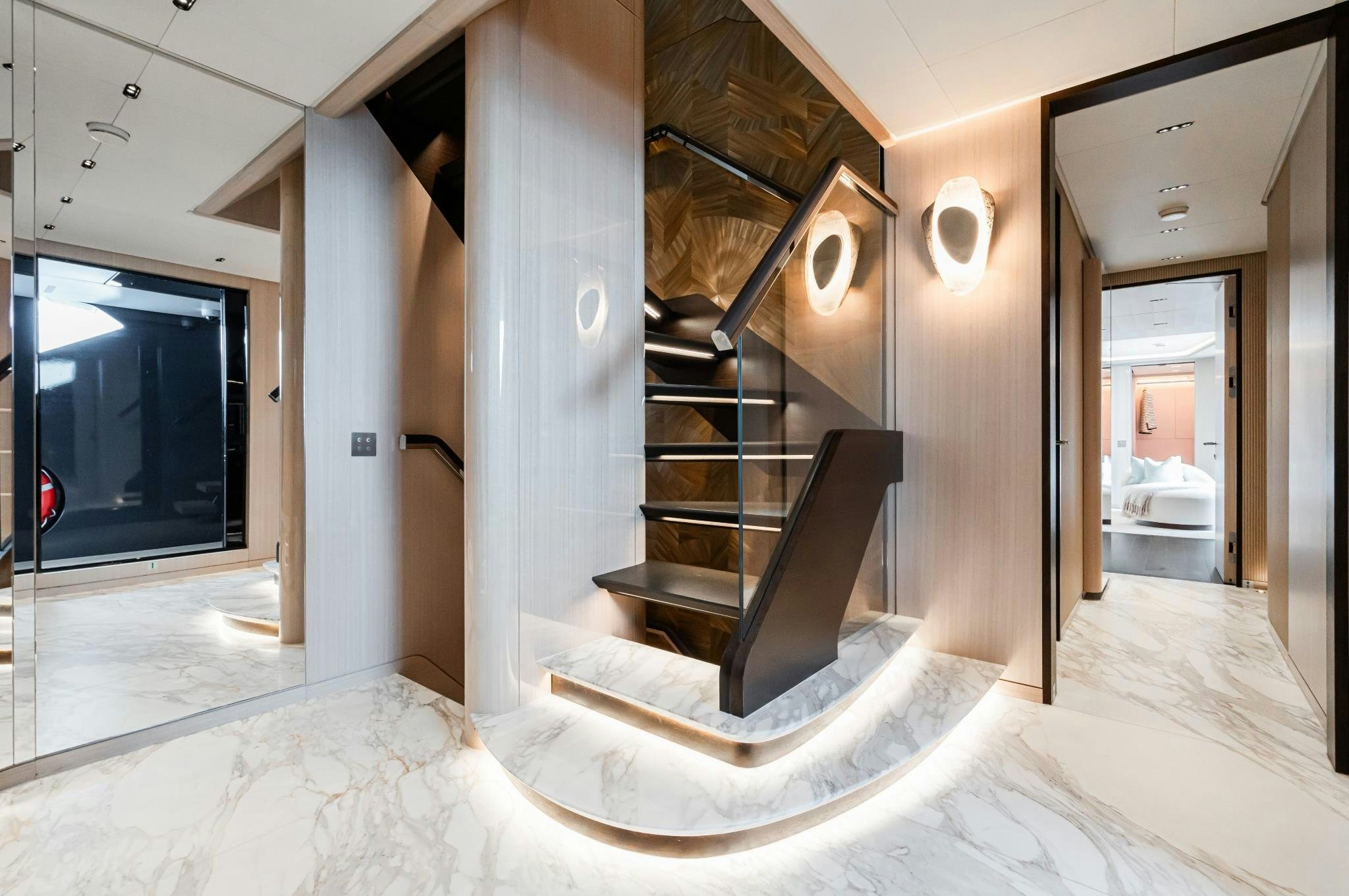 a large staircase in a building aboard M Yacht for Sale