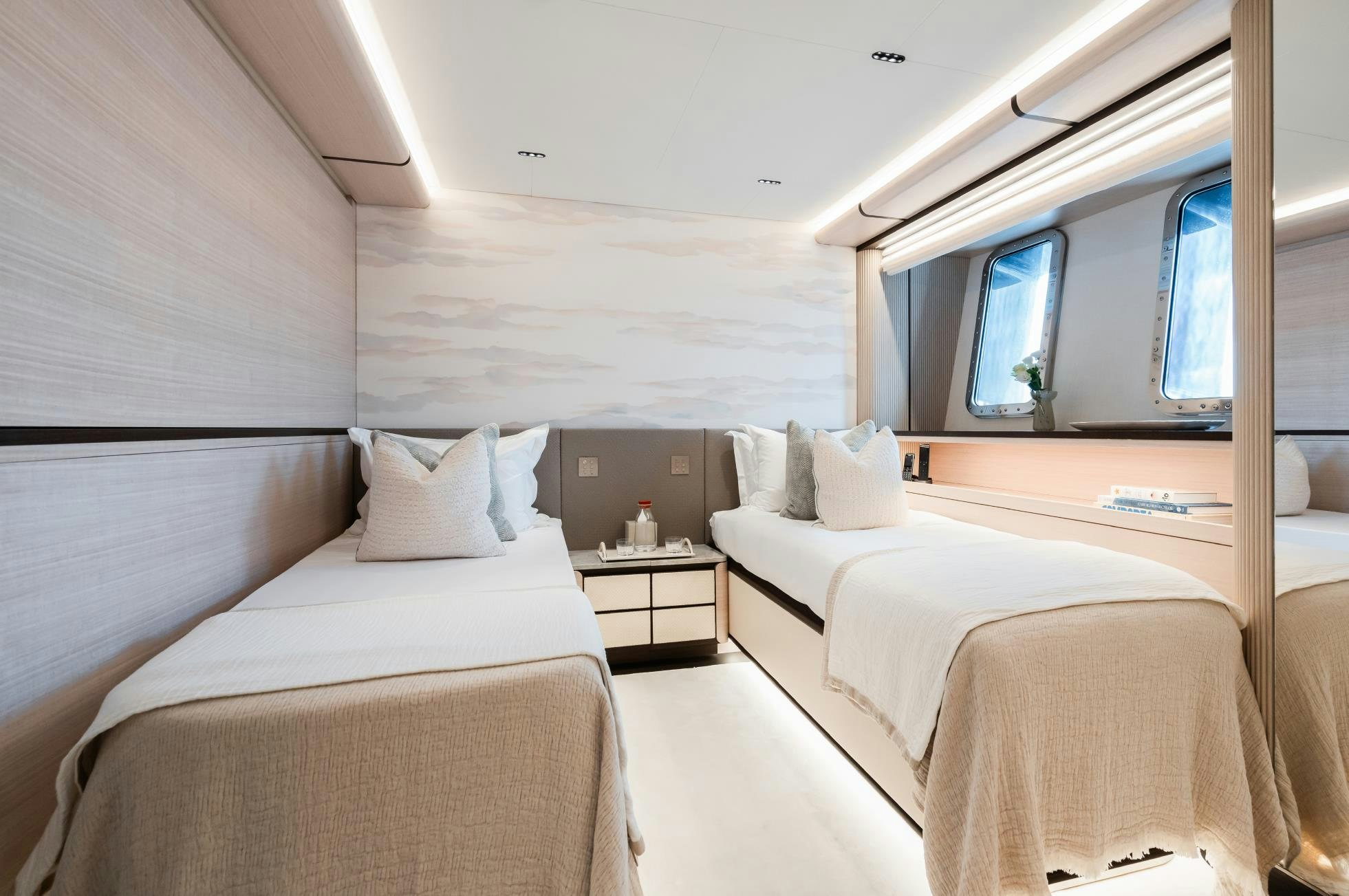 a room with beds and a window aboard M Yacht for Sale