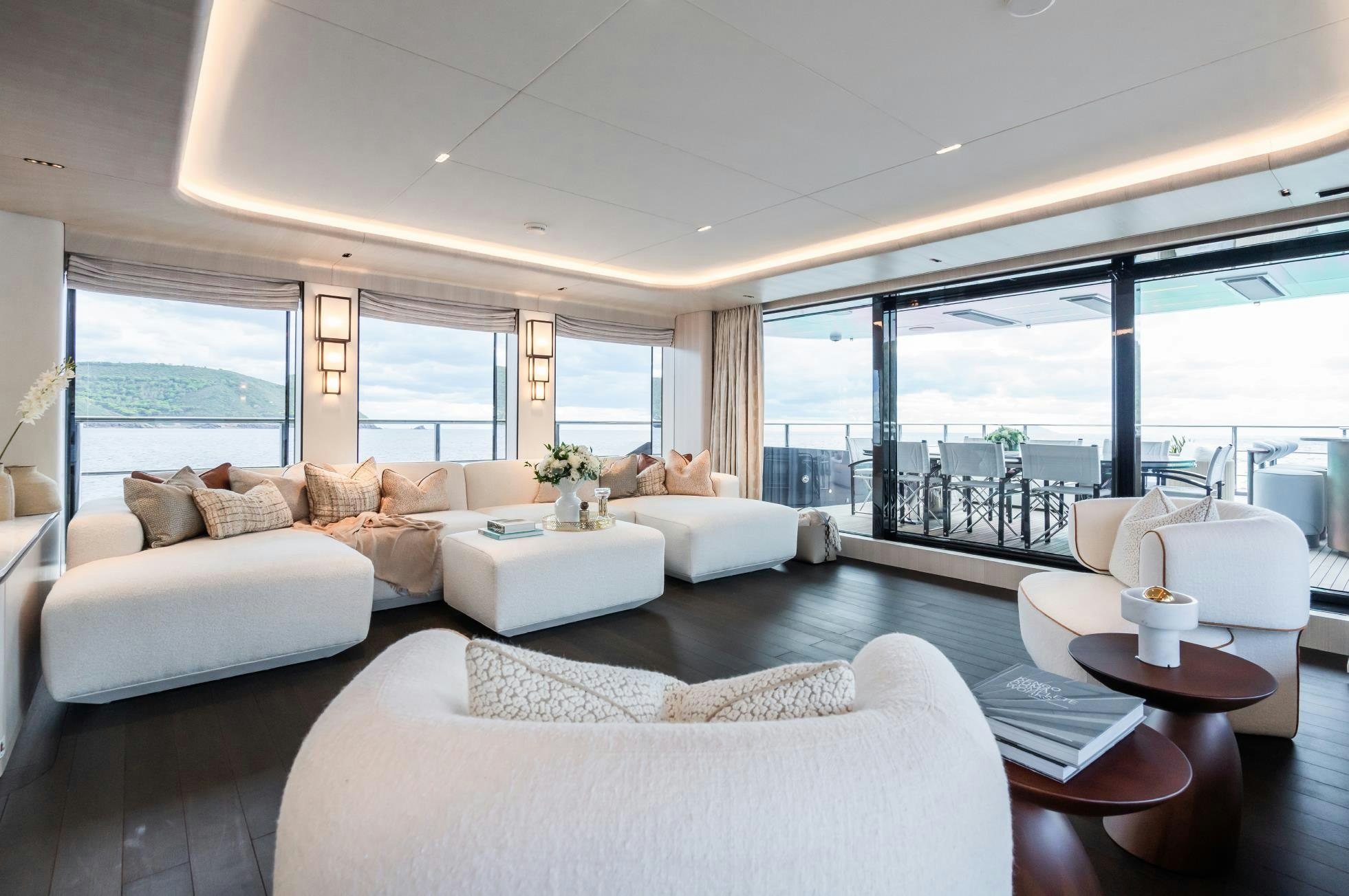 a living room with a large window aboard M Yacht for Sale