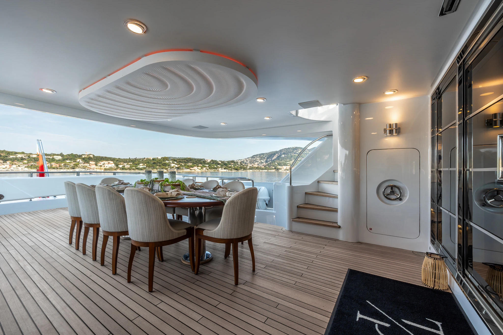 a room with a table and chairs aboard TITIAN PEARL Yacht for Sale