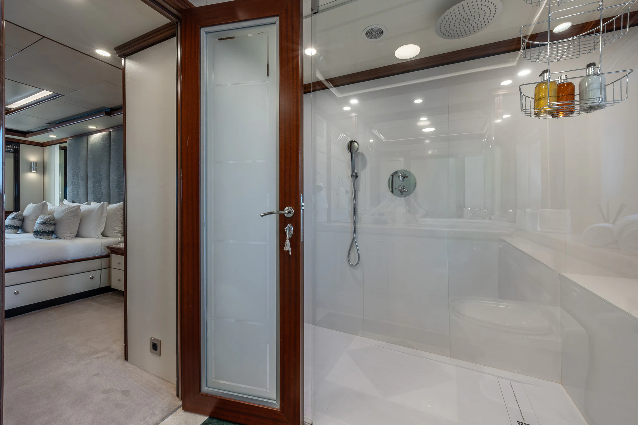 a bathroom with a shower and a sink aboard TITIAN PEARL Yacht for Sale