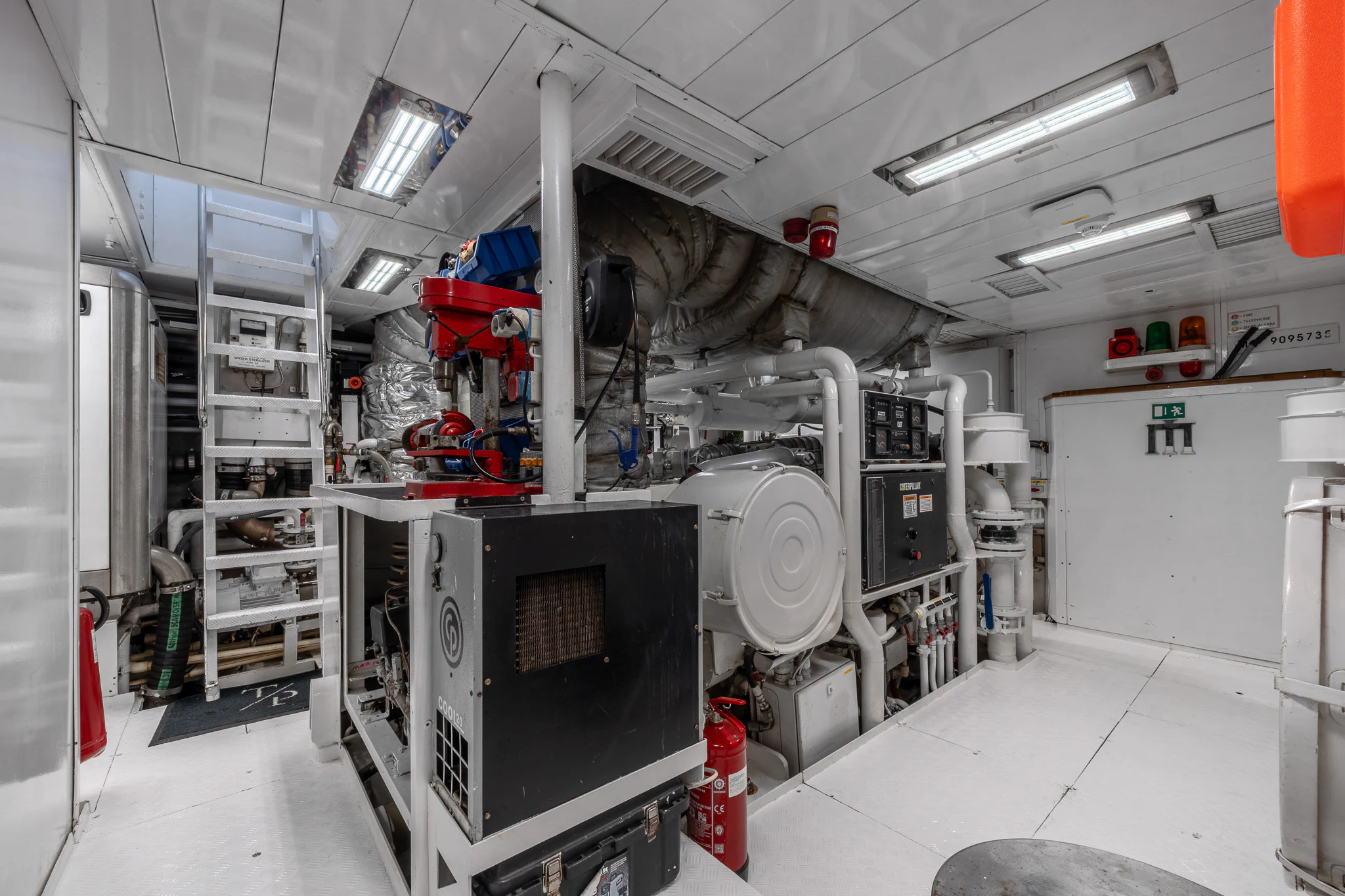 a room with machines and equipment aboard TITIAN PEARL Yacht for Sale