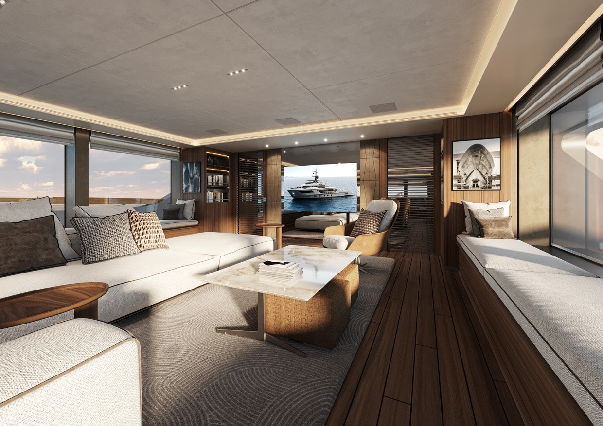 a room with a large bed and a table aboard PARA BELLUM Yacht for Charter
