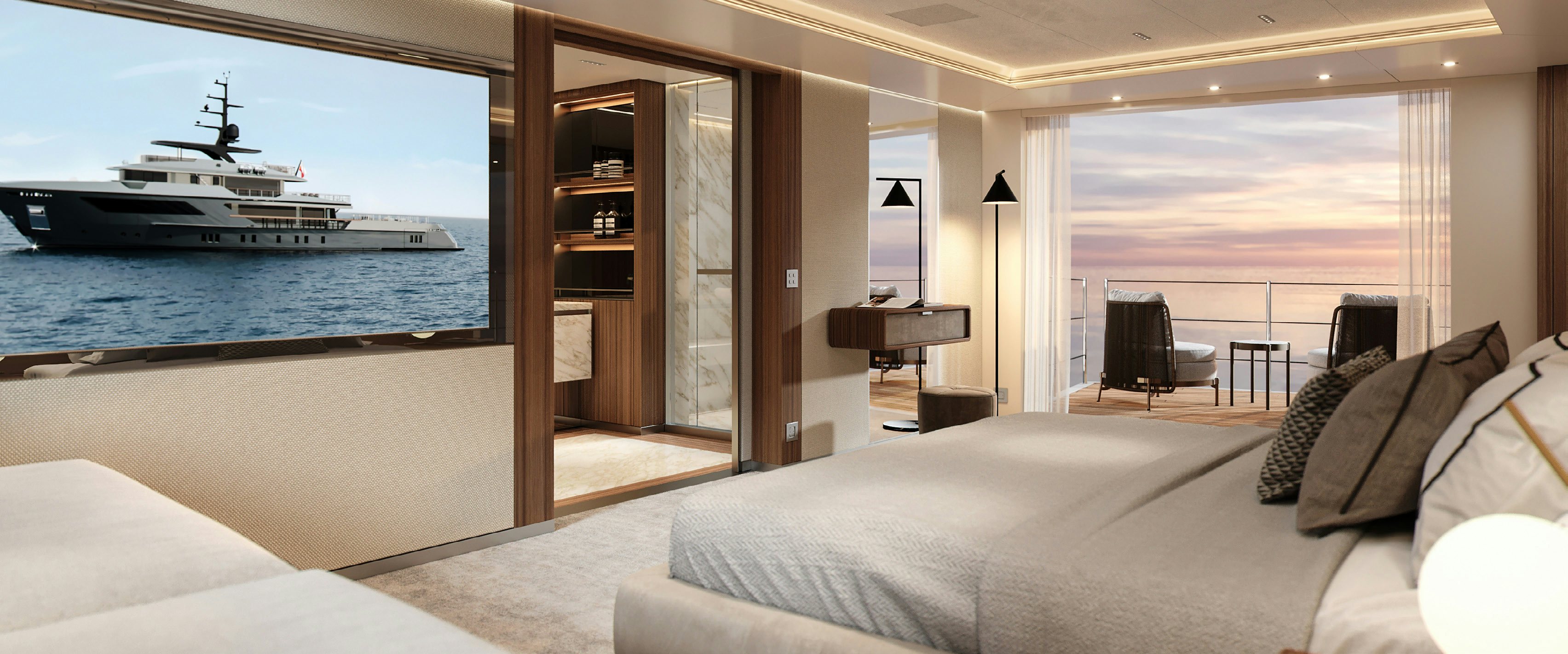 a room with a bed and a desk and a large ship in the background aboard PARA BELLUM Yacht for Charter