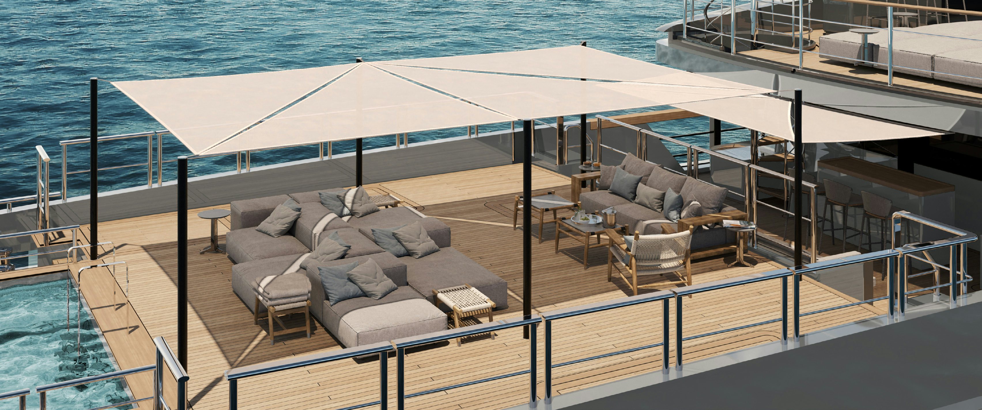 a deck with a couch and a pool aboard PARA BELLUM Yacht for Charter