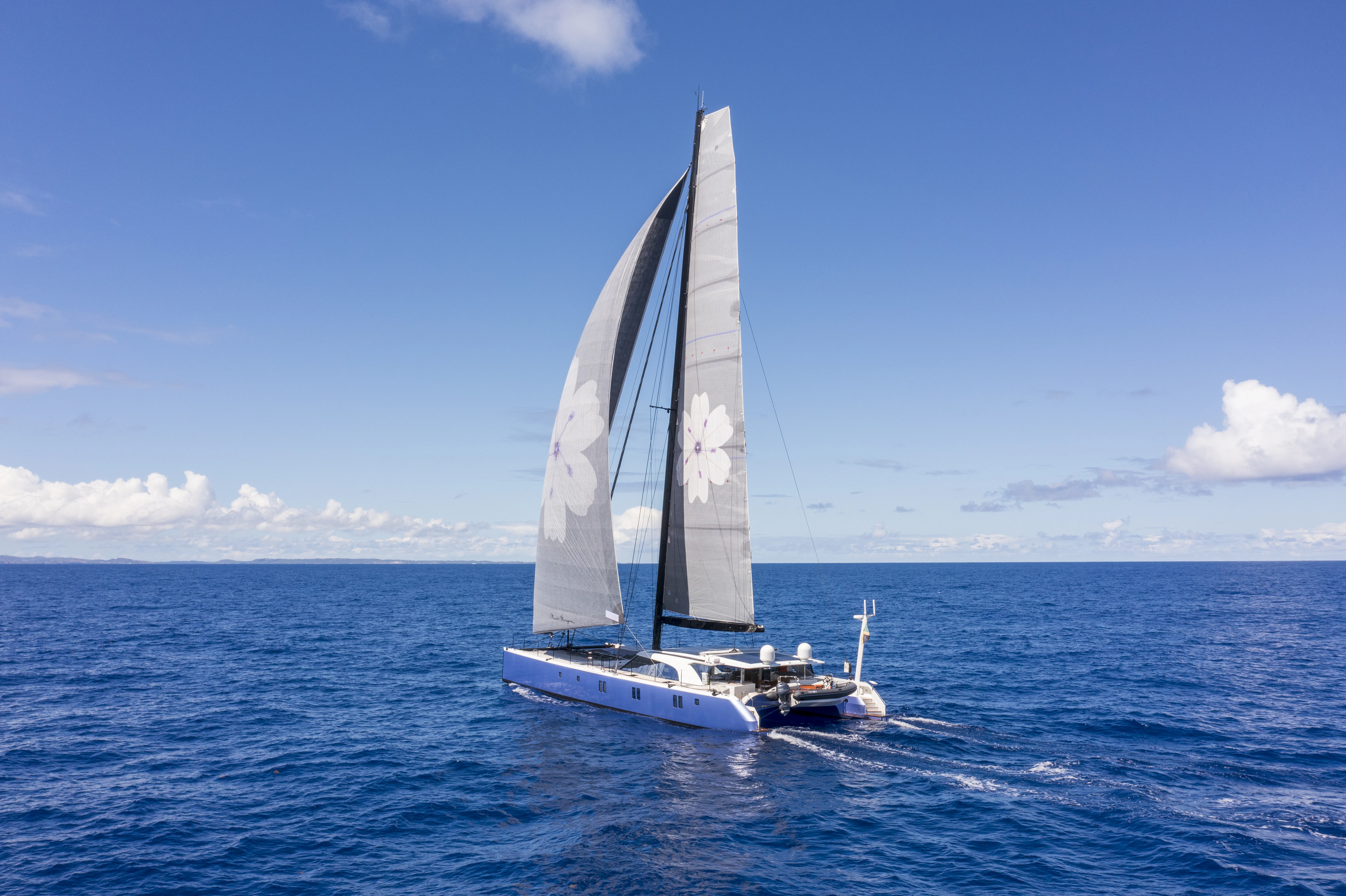 a sailboat in the water aboard TIGER LILY TOO Yacht for Sale