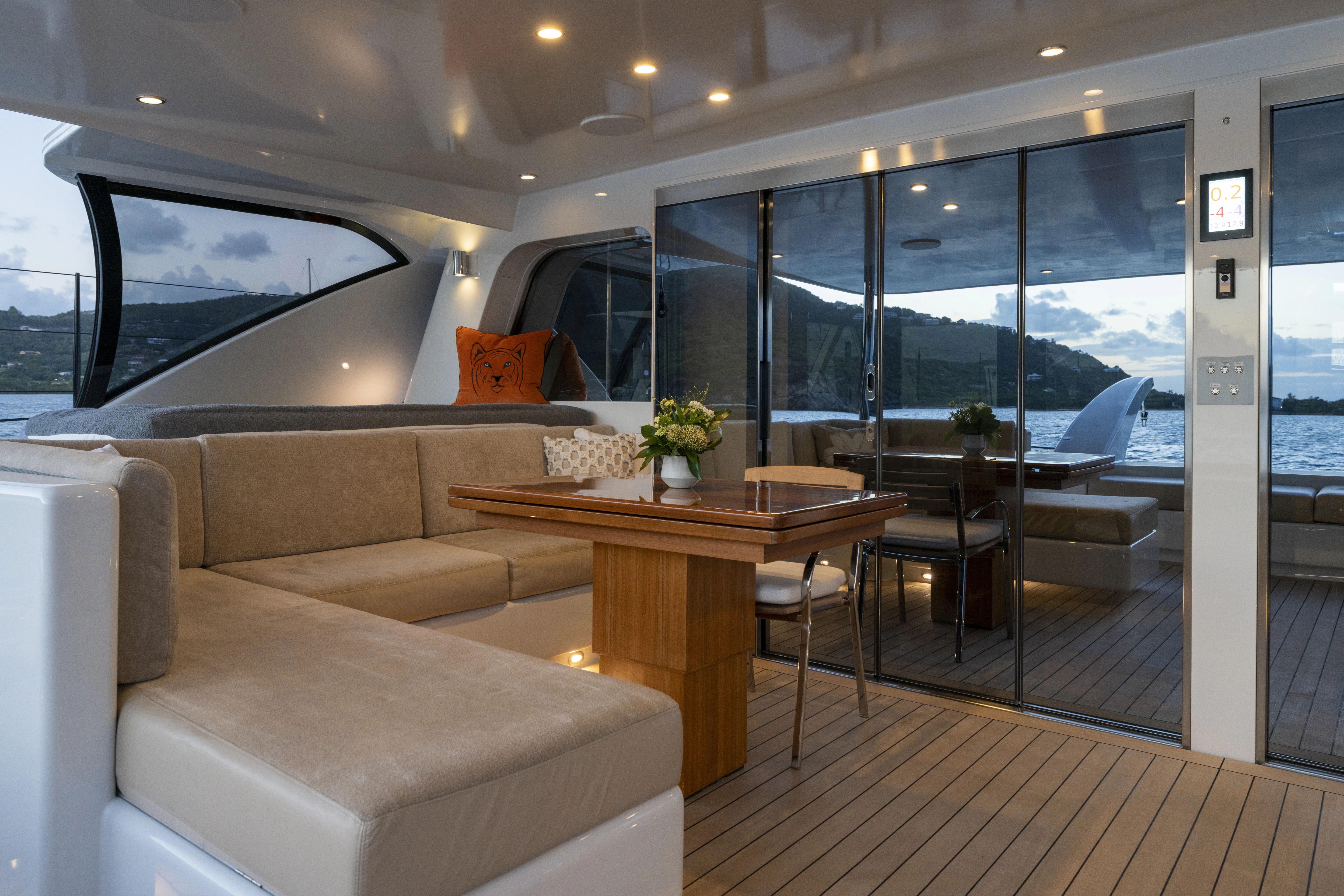 a living room with a couch and a table aboard TIGER LILY TOO Yacht for Sale