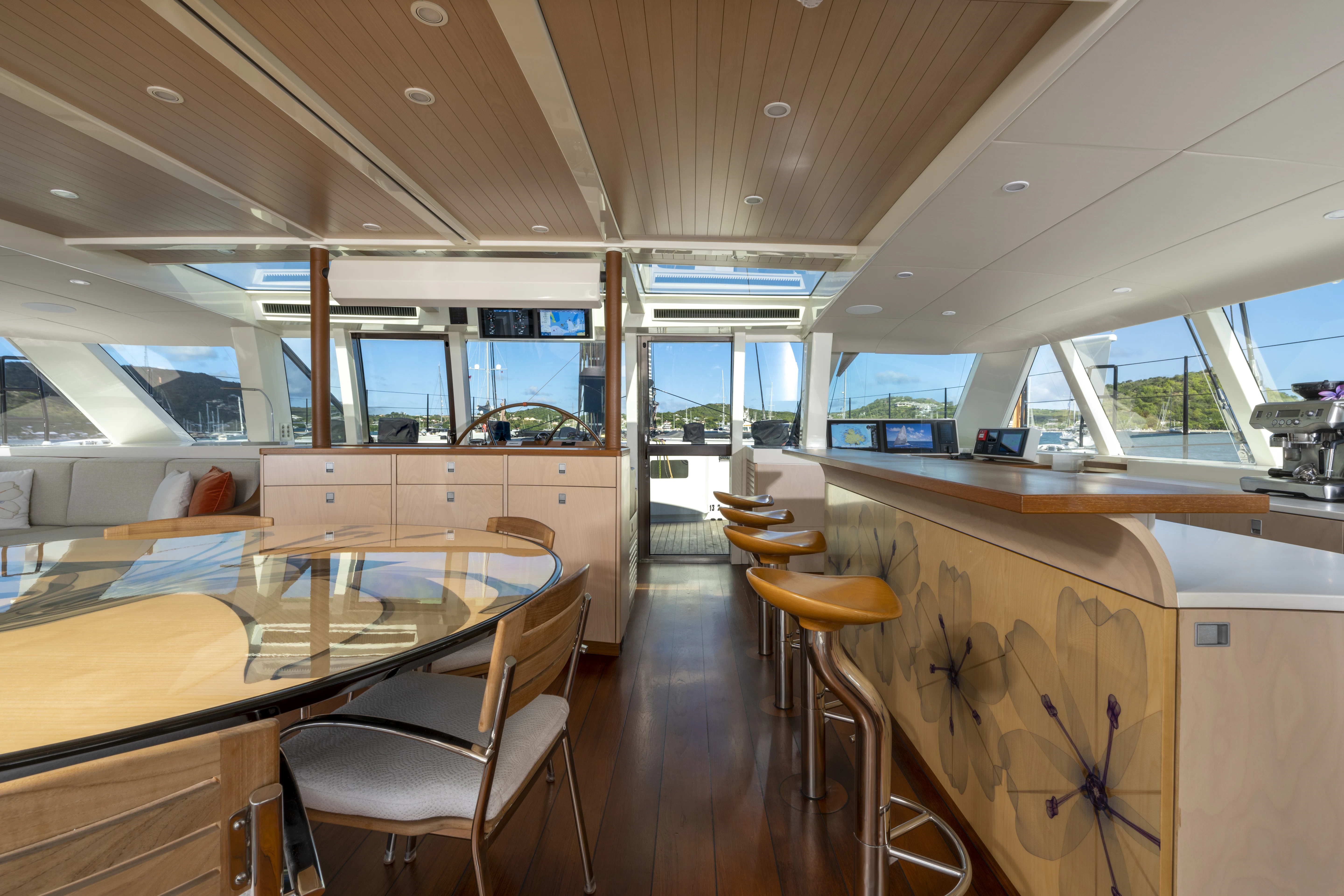 a room with a table and chairs aboard TIGER LILY TOO Yacht for Sale