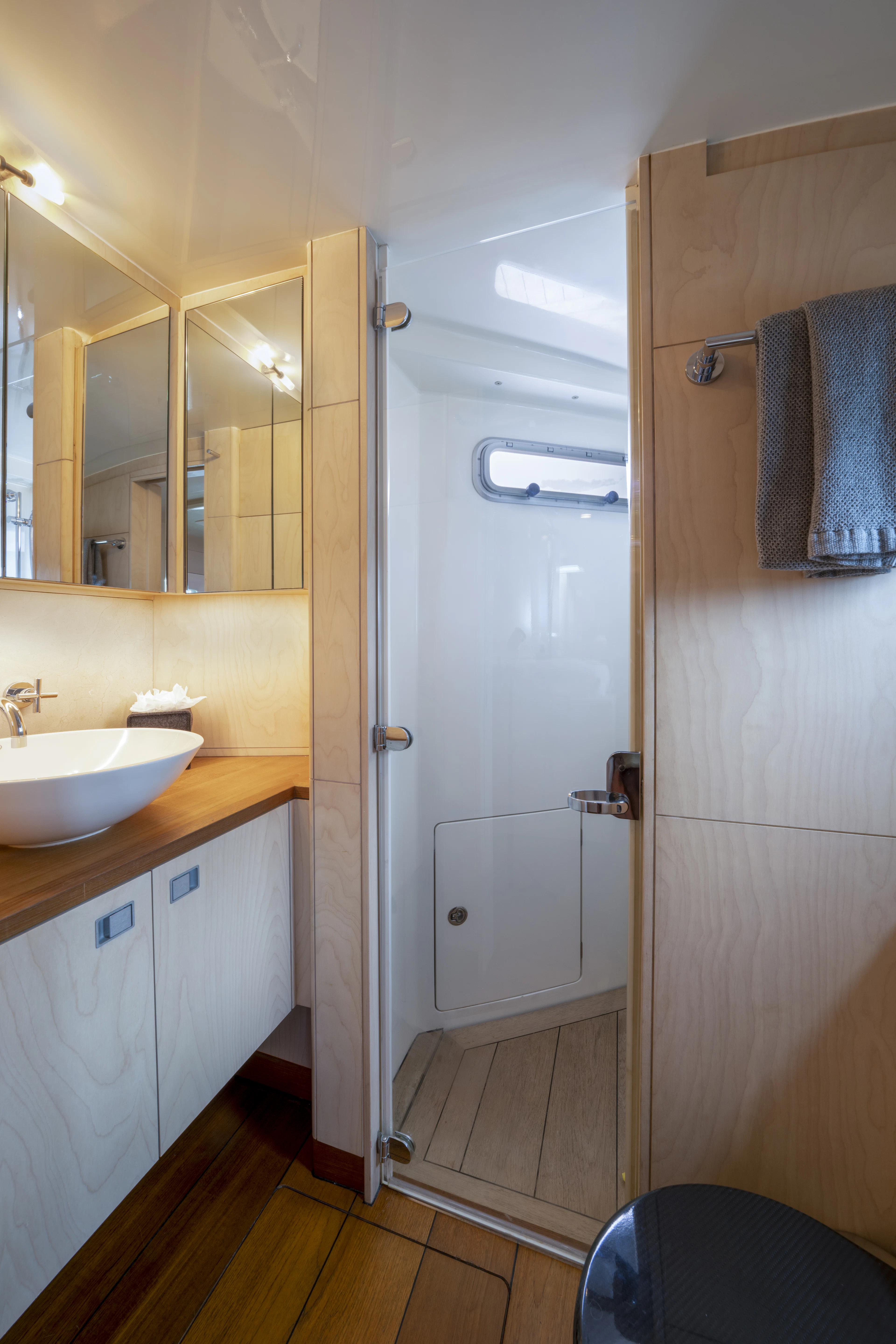 a bathroom with a sink and a mirror aboard TIGER LILY TOO Yacht for Sale