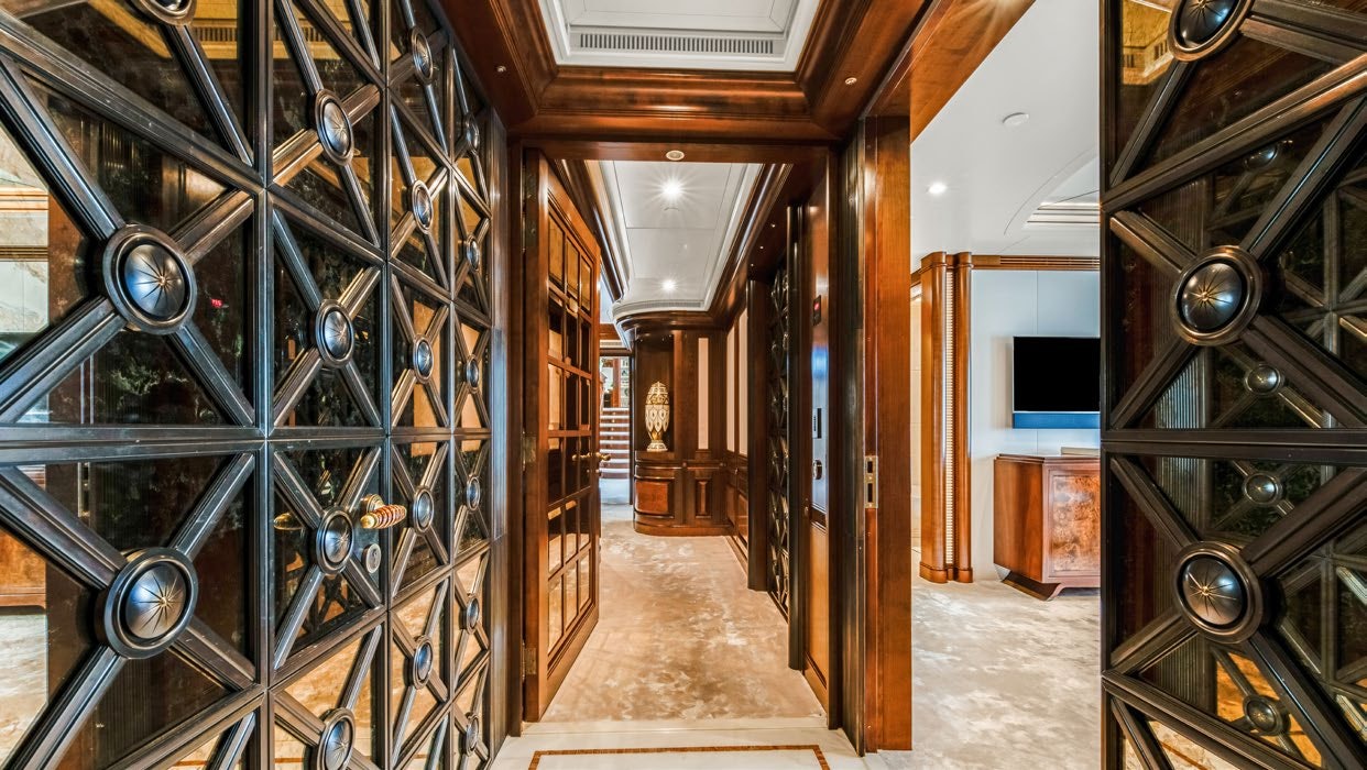 a room with a large glass door aboard CALYPSO Yacht for Sale