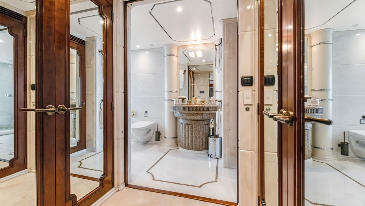 a bathroom with a sink and a toilet aboard CALYPSO Yacht for Sale
