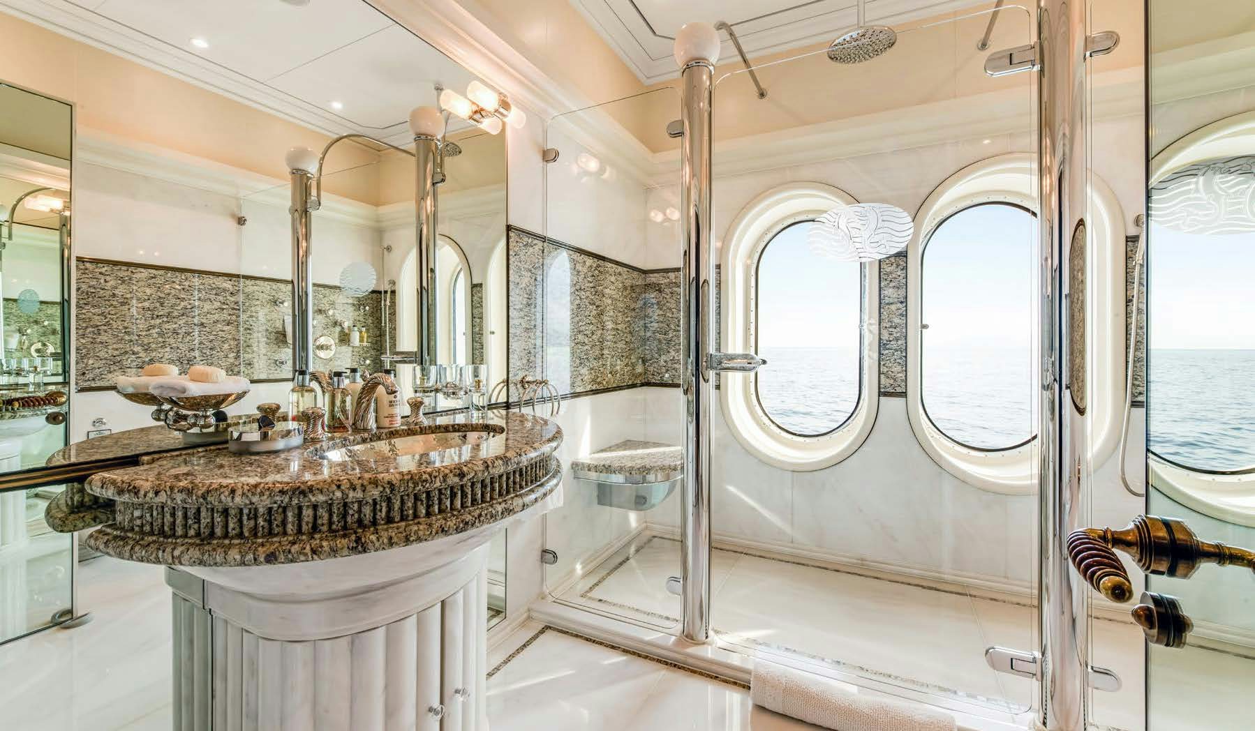 a bathroom with a sink and a bathtub aboard CALYPSO Yacht for Sale