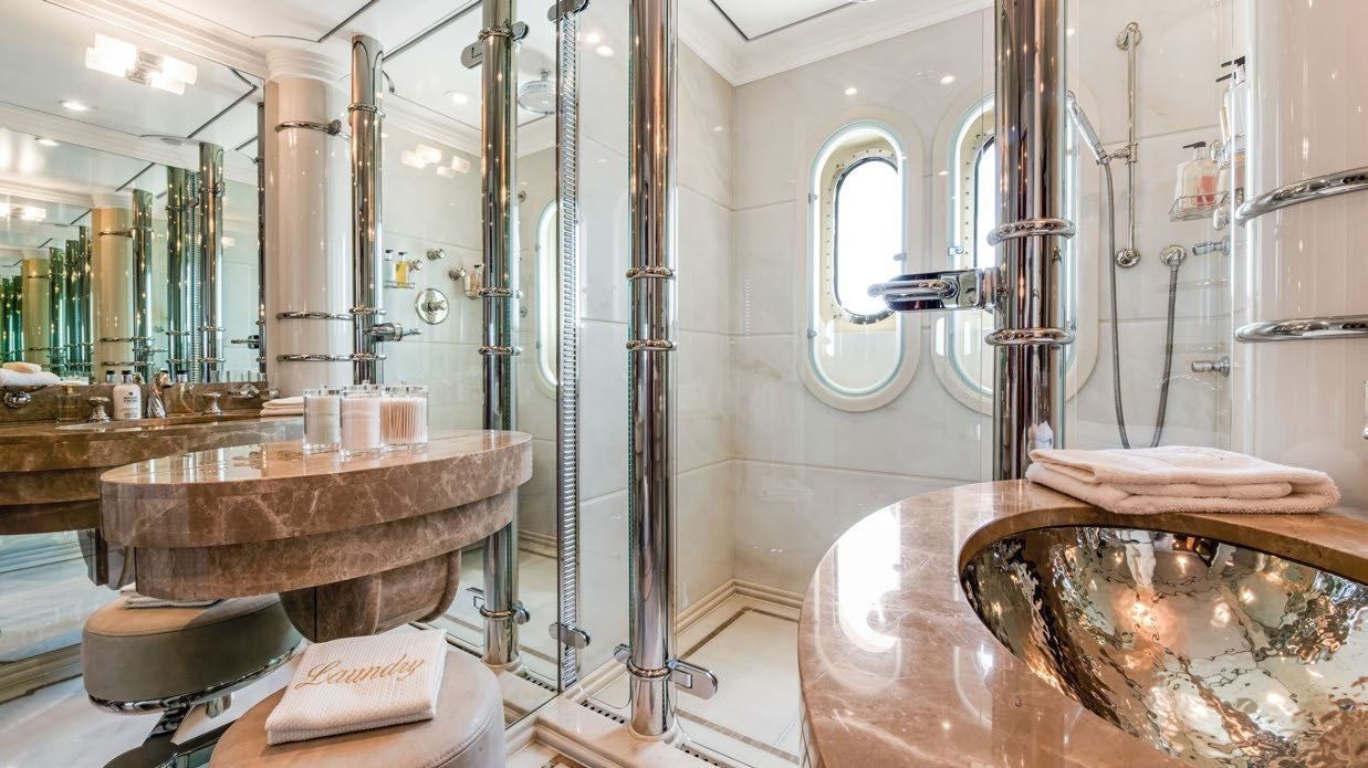 a bathroom with a large sink aboard CALYPSO Yacht for Sale