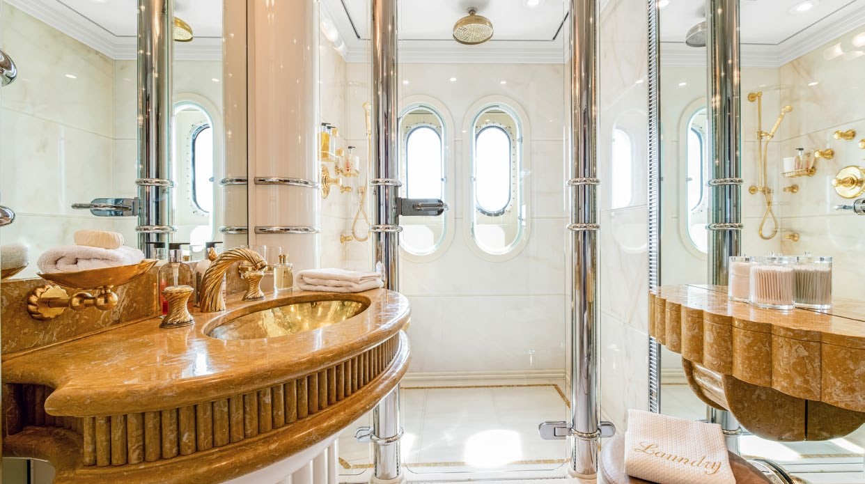 a bathroom with a sink and a mirror aboard CALYPSO Yacht for Sale