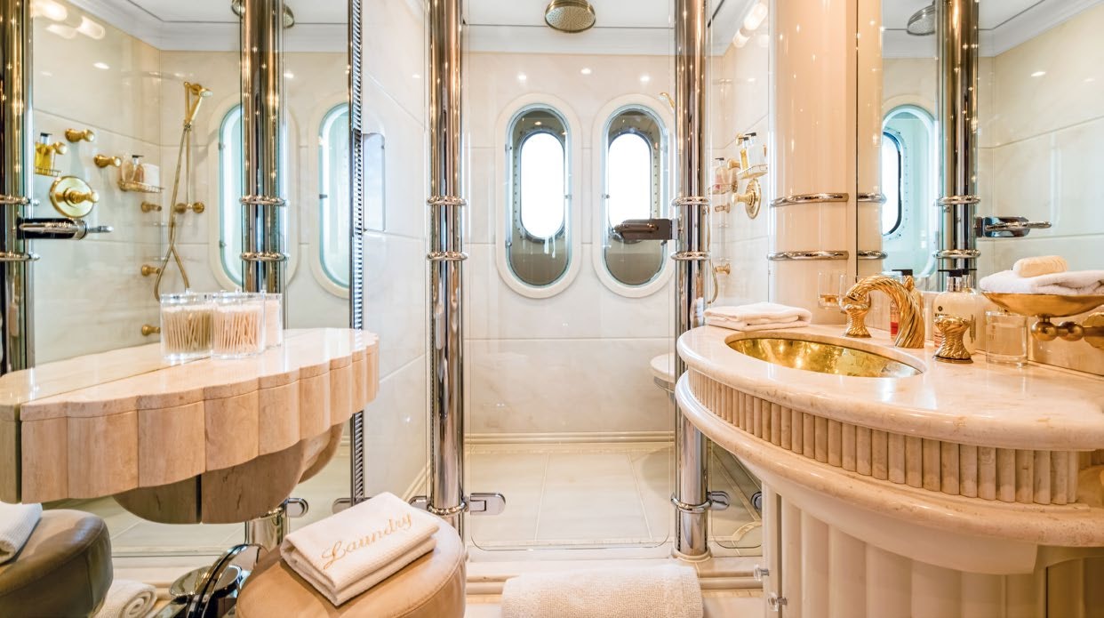 a bathroom with a sink and a mirror aboard CALYPSO Yacht for Sale