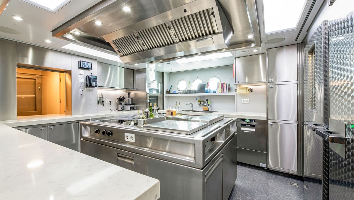 a kitchen with stainless steel appliances aboard CALYPSO Yacht for Sale