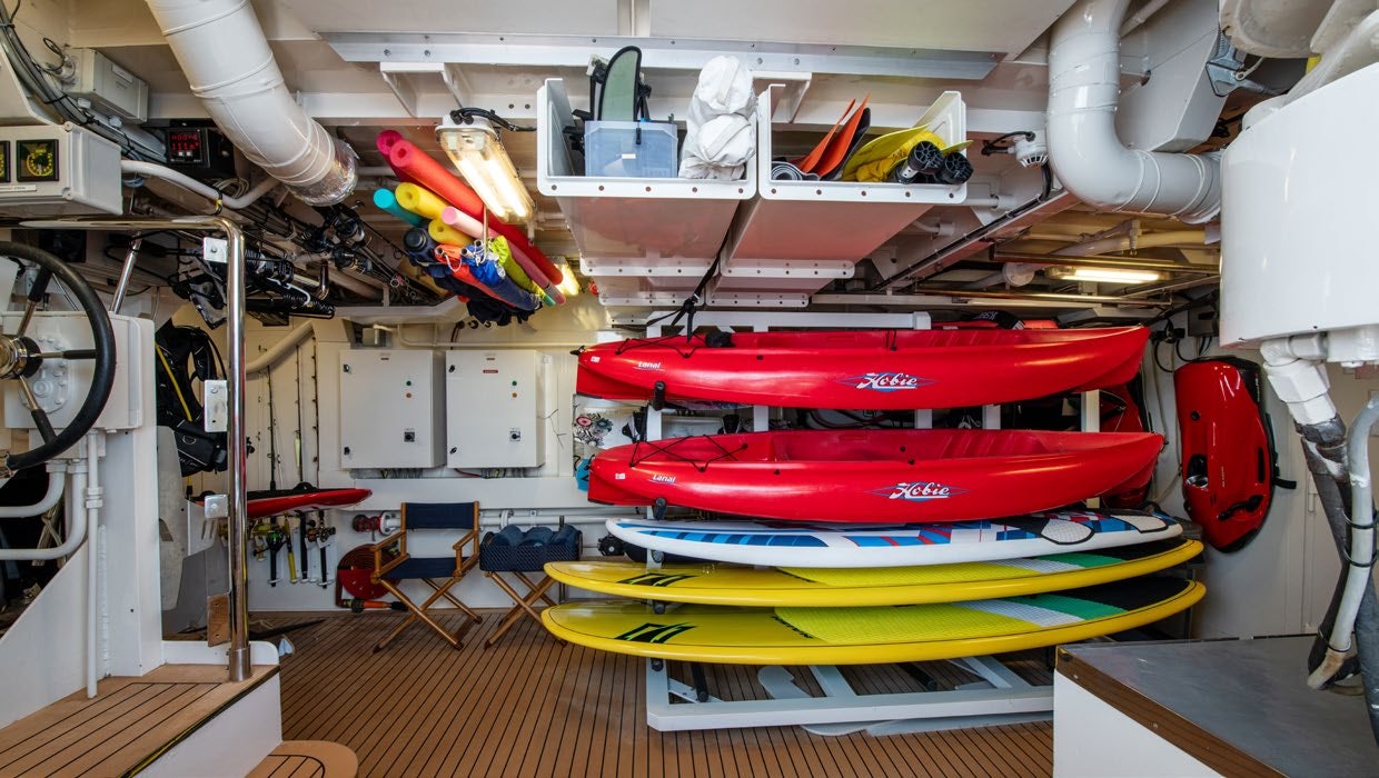a group of boats in a garage aboard CALYPSO Yacht for Sale