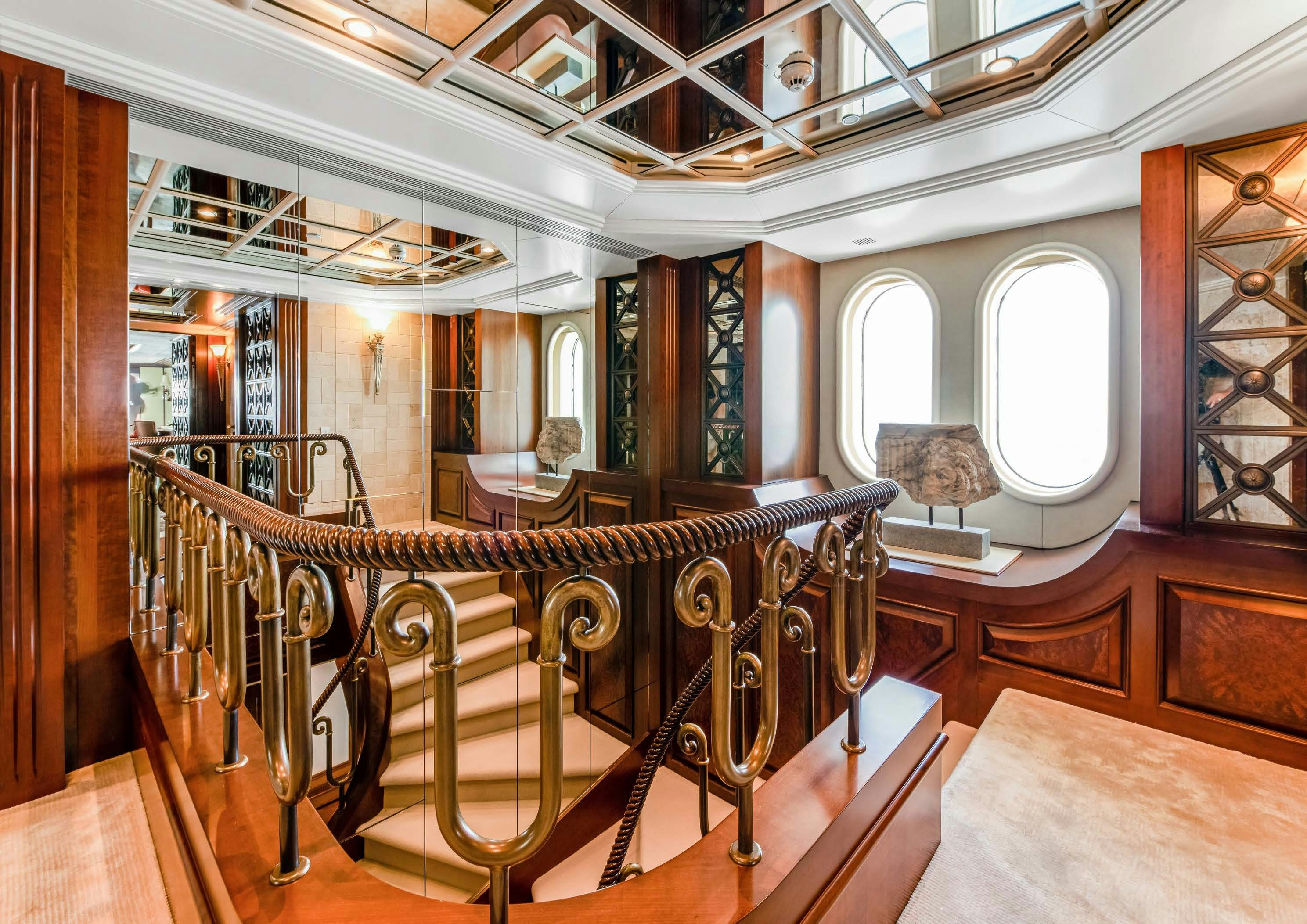 a large room with a balcony aboard CALYPSO Yacht for Sale