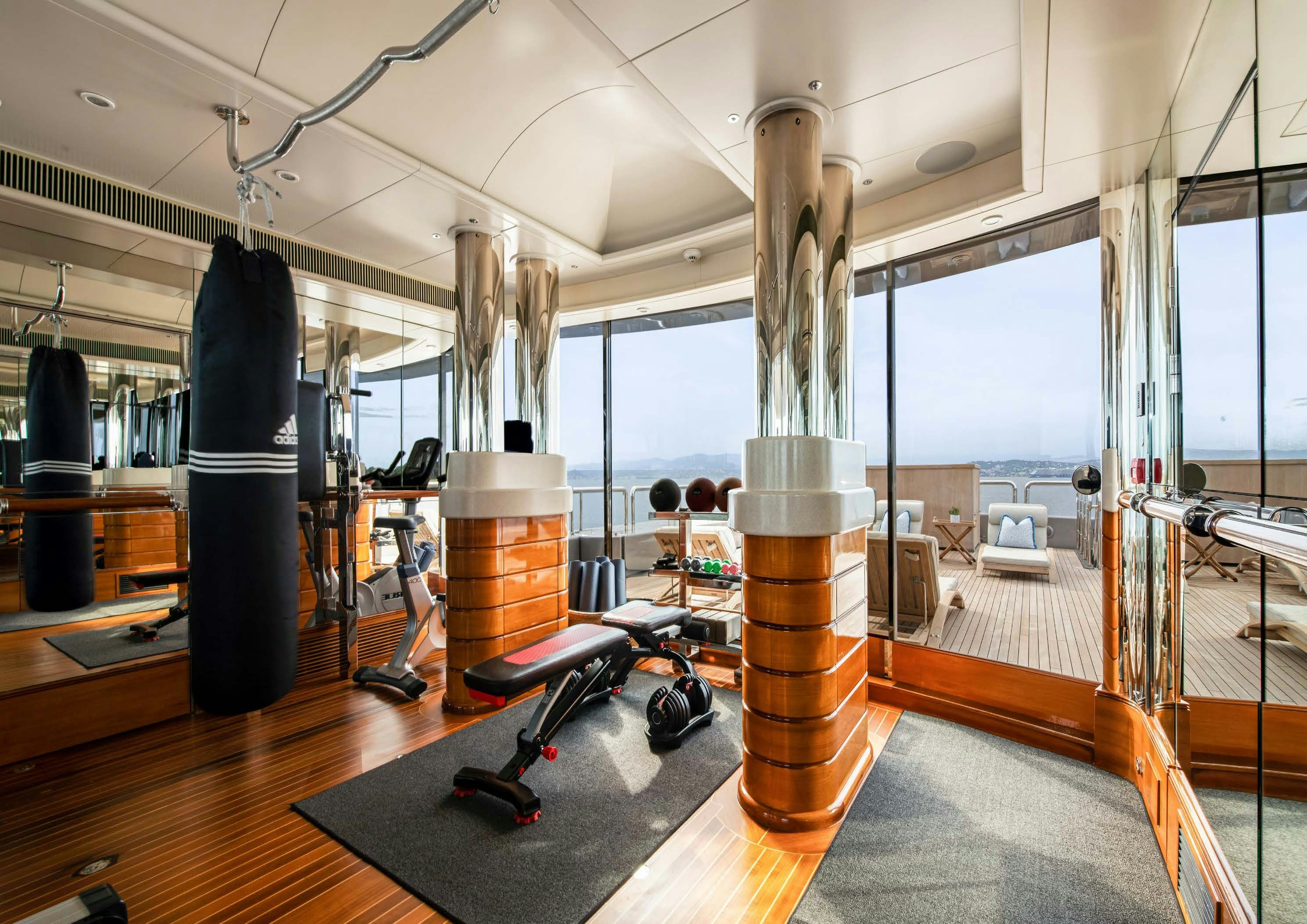 a large room with large windows aboard CALYPSO Yacht for Sale