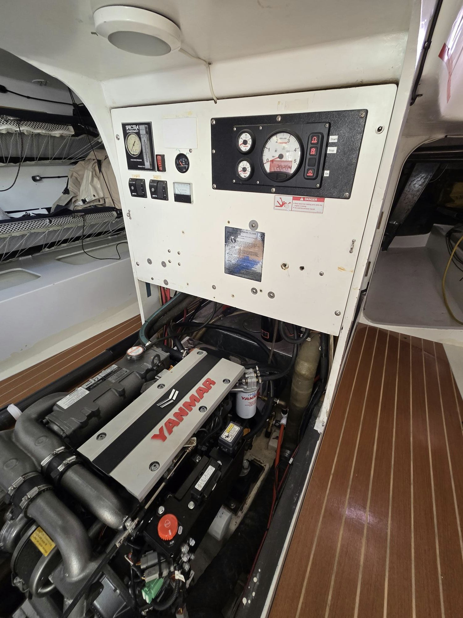 a car with a screen aboard PELIGROSO Yacht for Sale