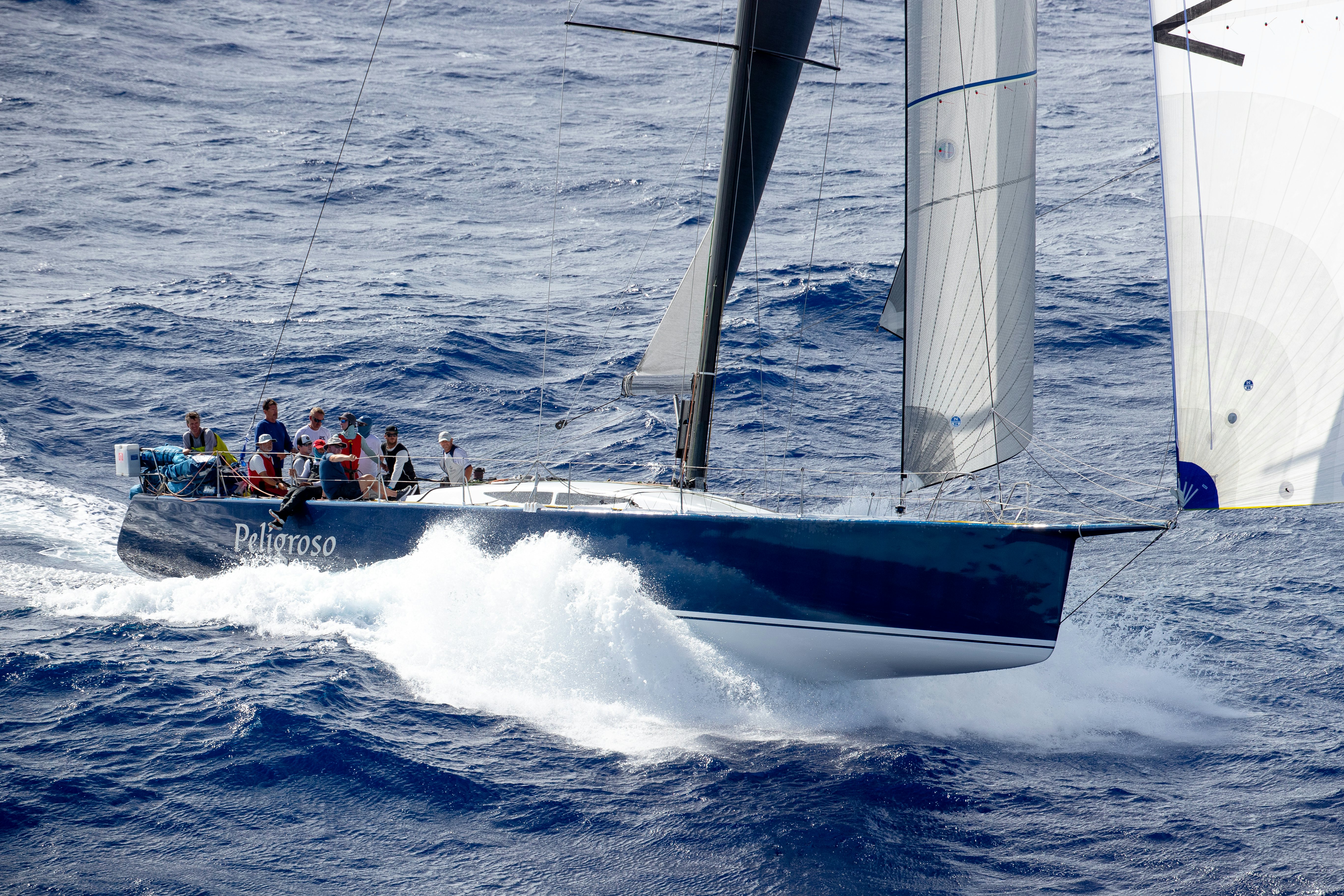 a group of people on a boat aboard PELIGROSO Yacht for Sale