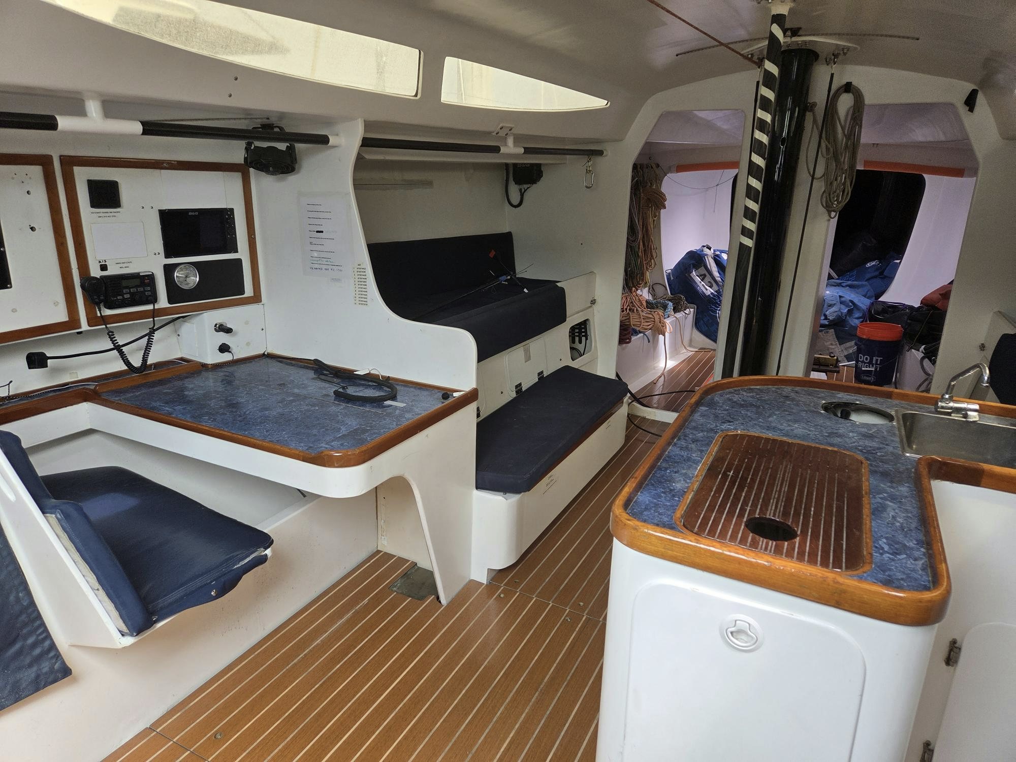 a kitchen with a sink and a microwave oven aboard PELIGROSO Yacht for Sale