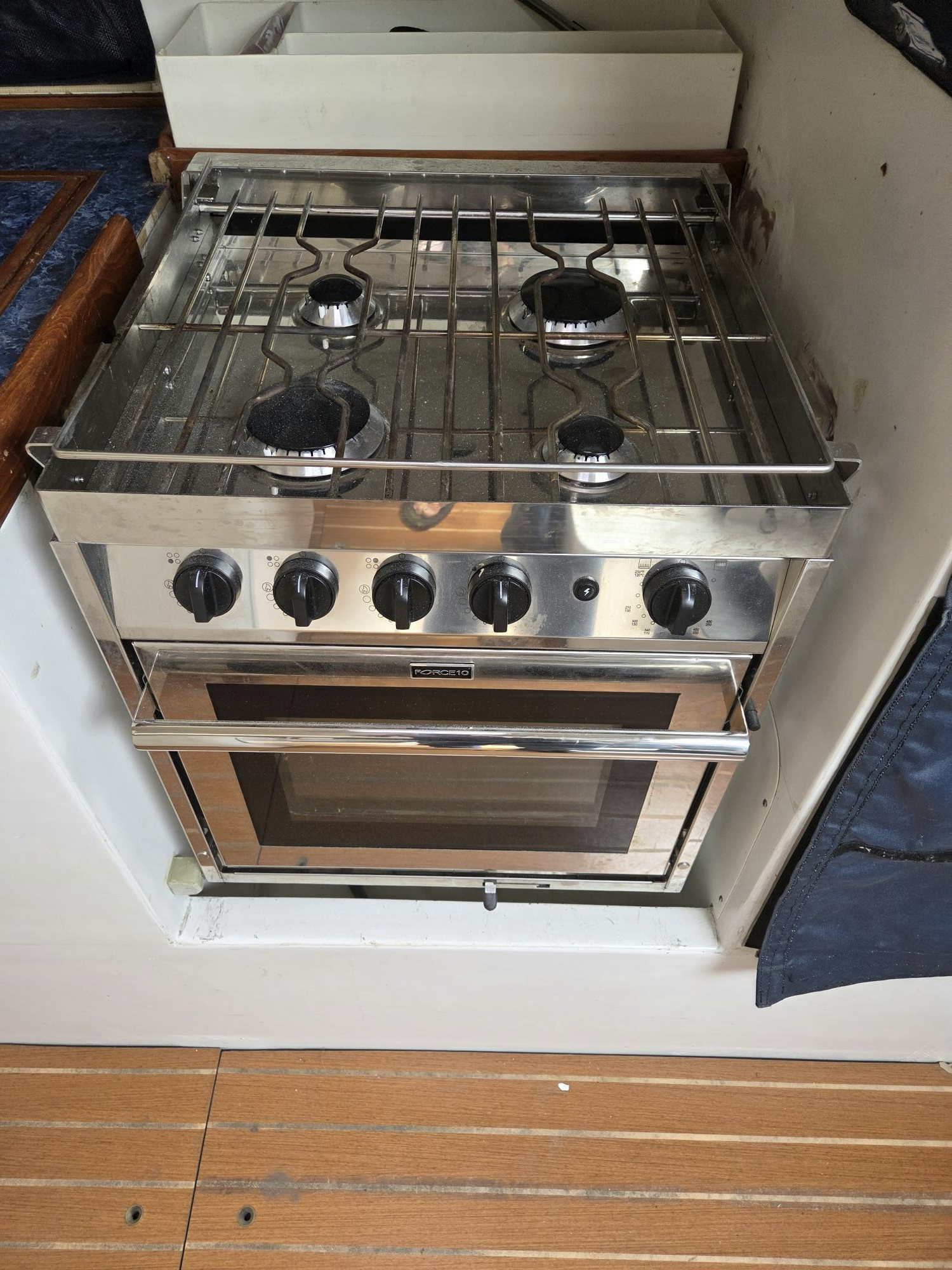 a large metal cabinet with black knobs aboard PELIGROSO Yacht for Sale