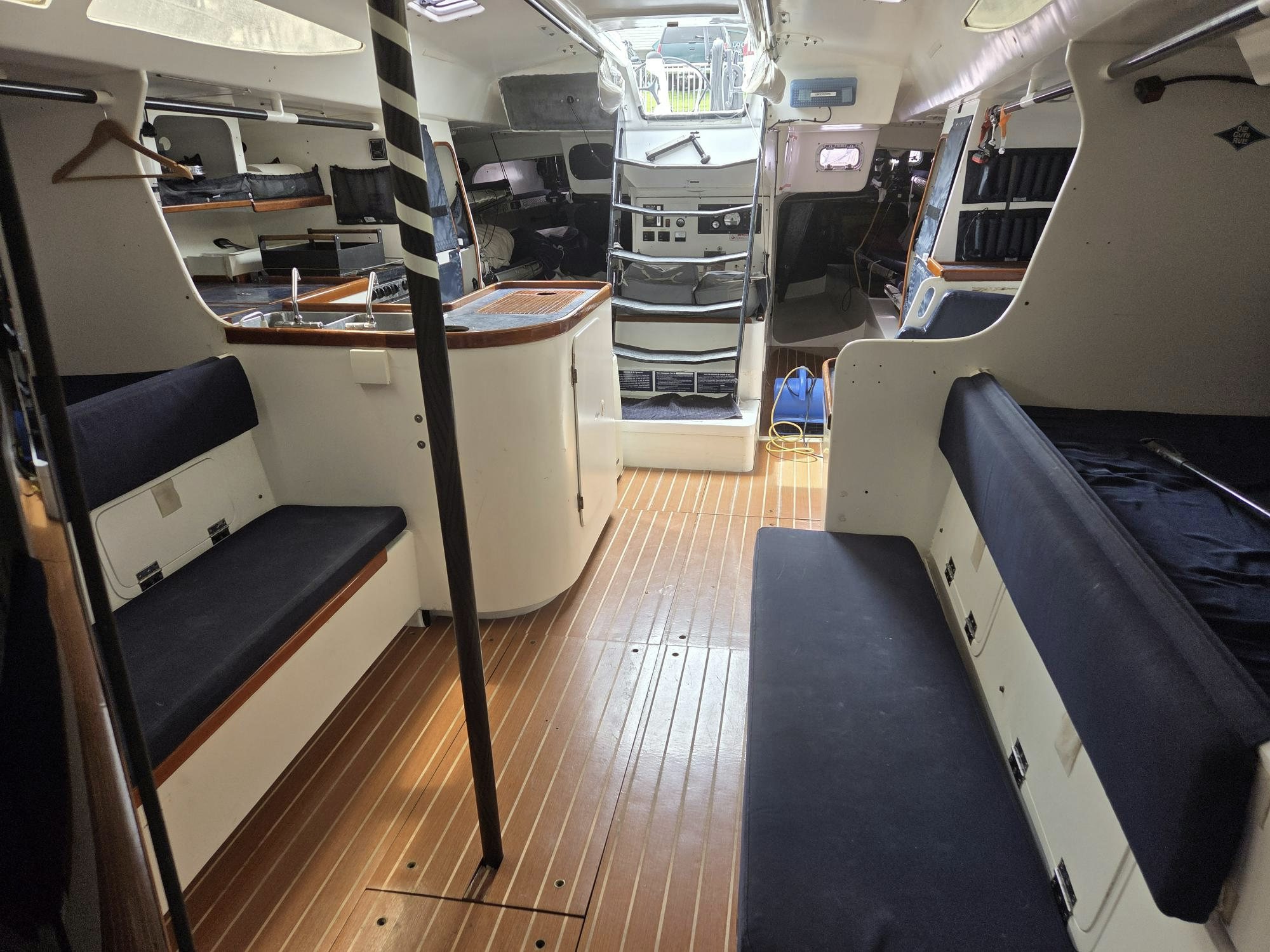 a room with a desk and chairs aboard PELIGROSO Yacht for Sale