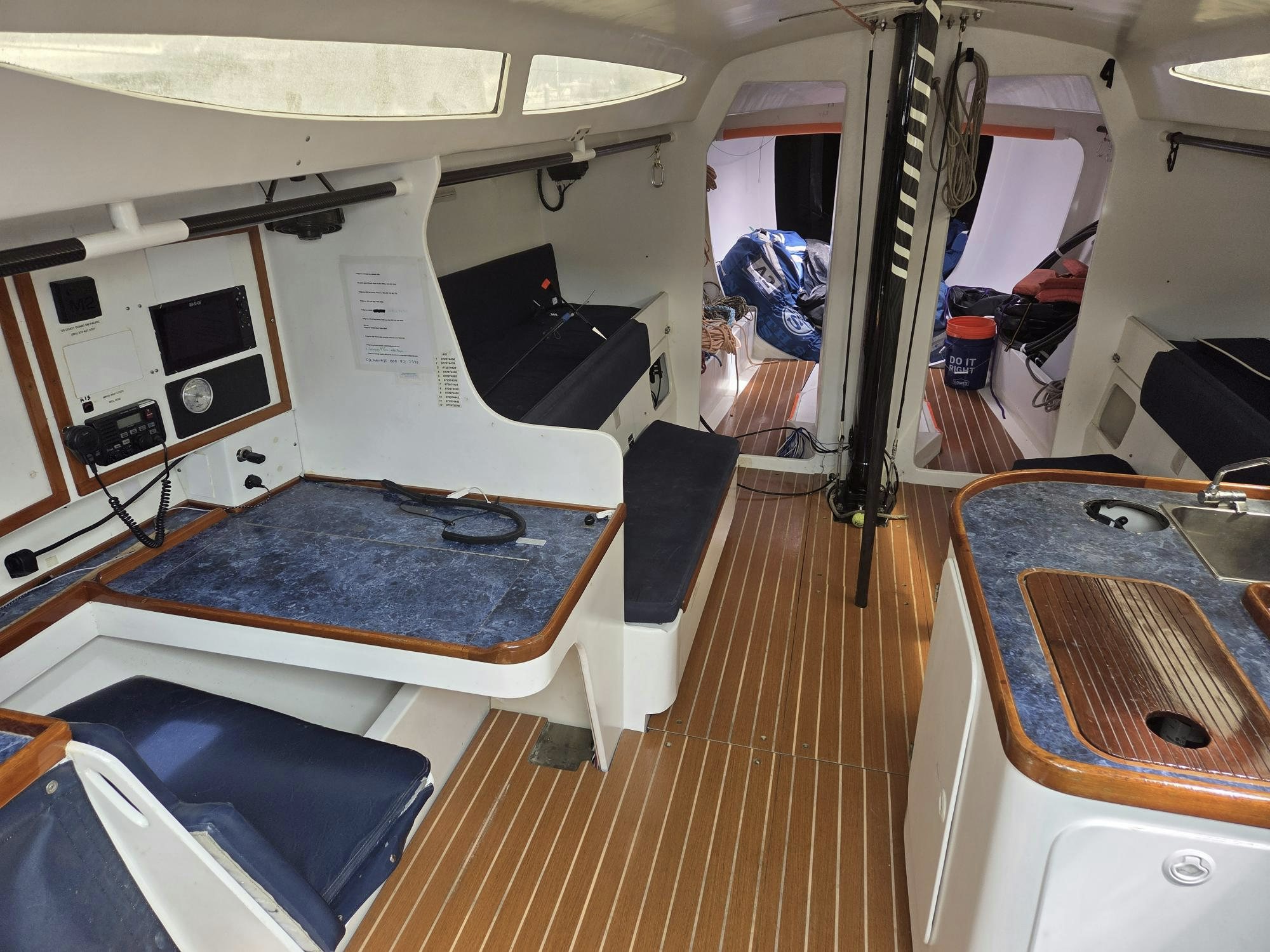 a room with a table and a sink aboard PELIGROSO Yacht for Sale