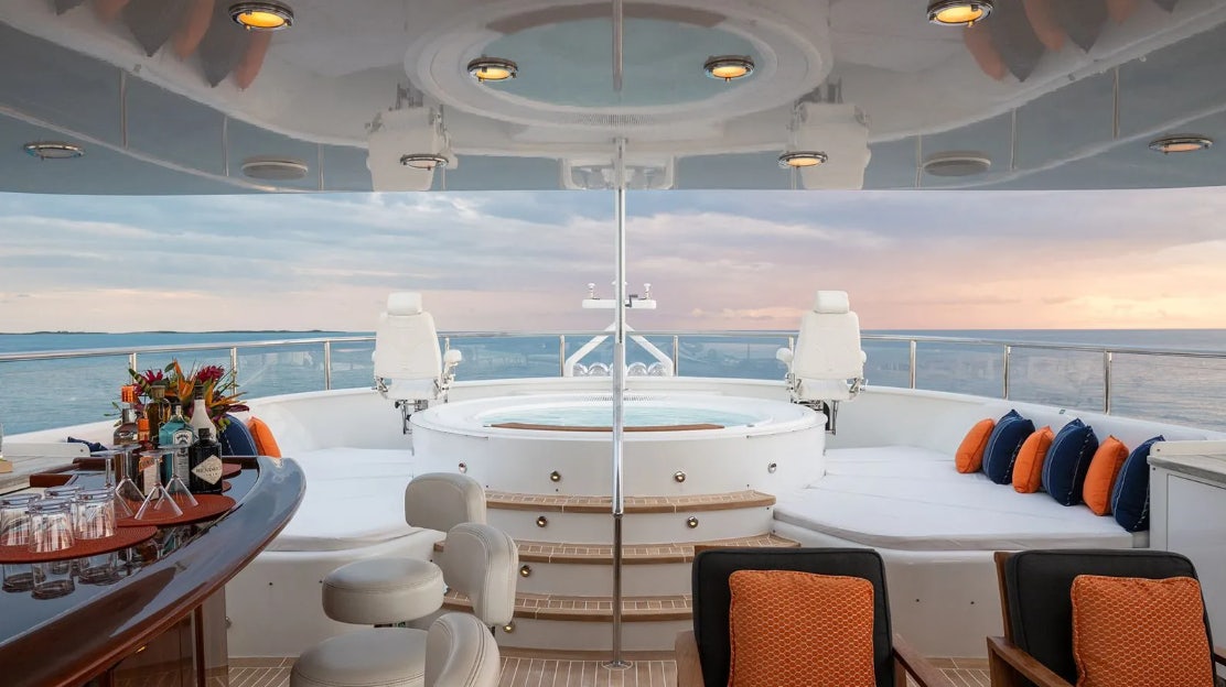 a white boat in a large room aboard CROSSED SABRE Yacht for Charter