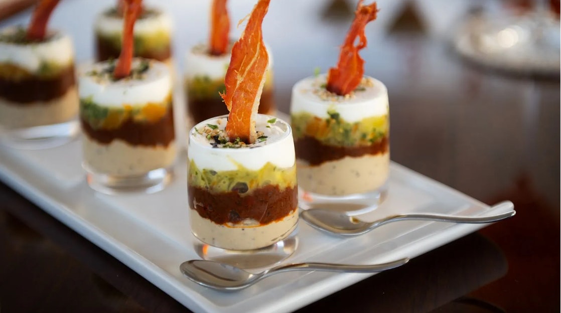a group of desserts on a plate aboard CROSSED SABRE Yacht for Charter