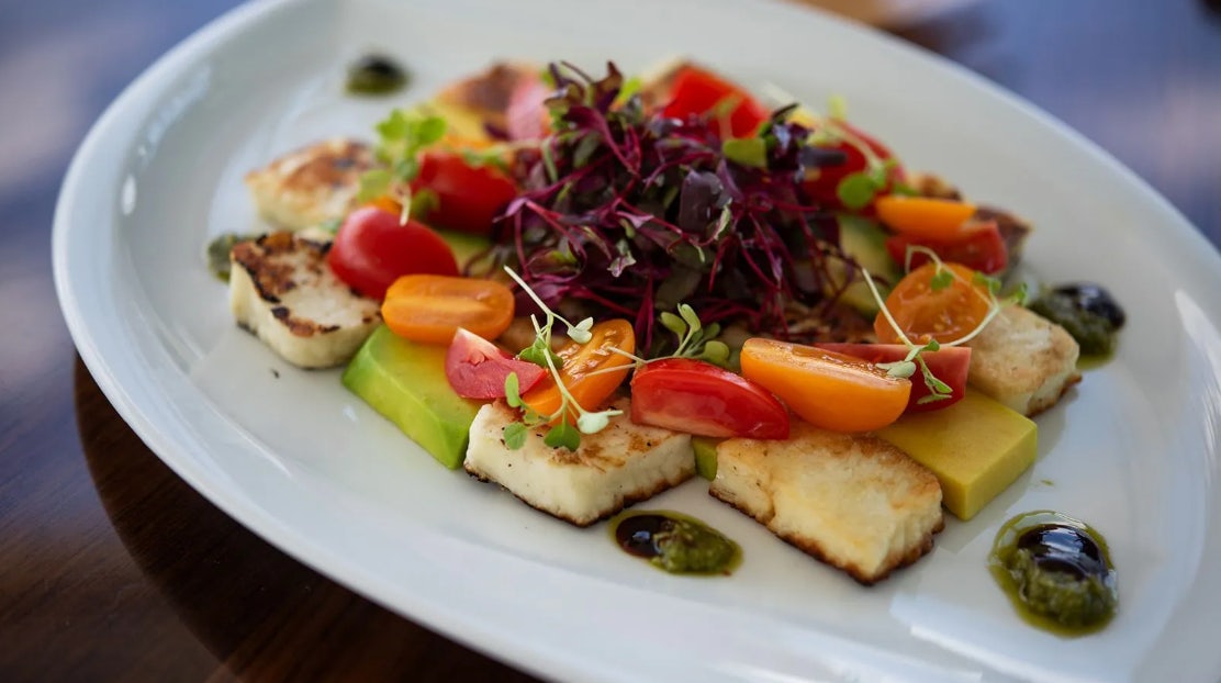 a plate of food aboard CROSSED SABRE Yacht for Charter