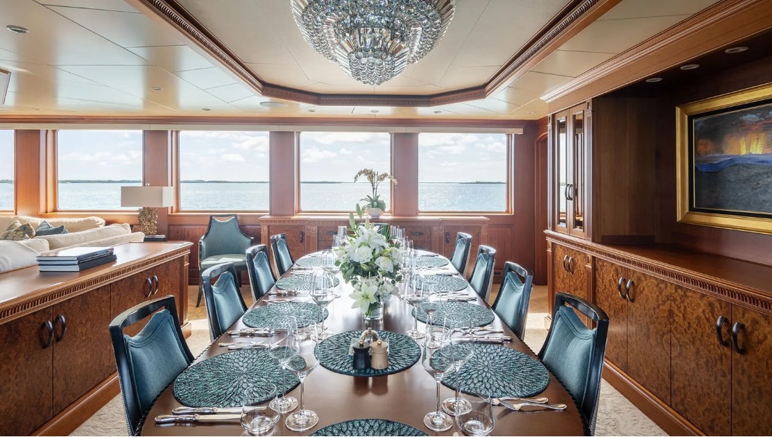 a dining table in a kitchen aboard CROSSED SABRE Yacht for Charter