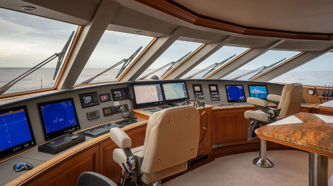 a room with many computers aboard CROSSED SABRE Yacht for Charter